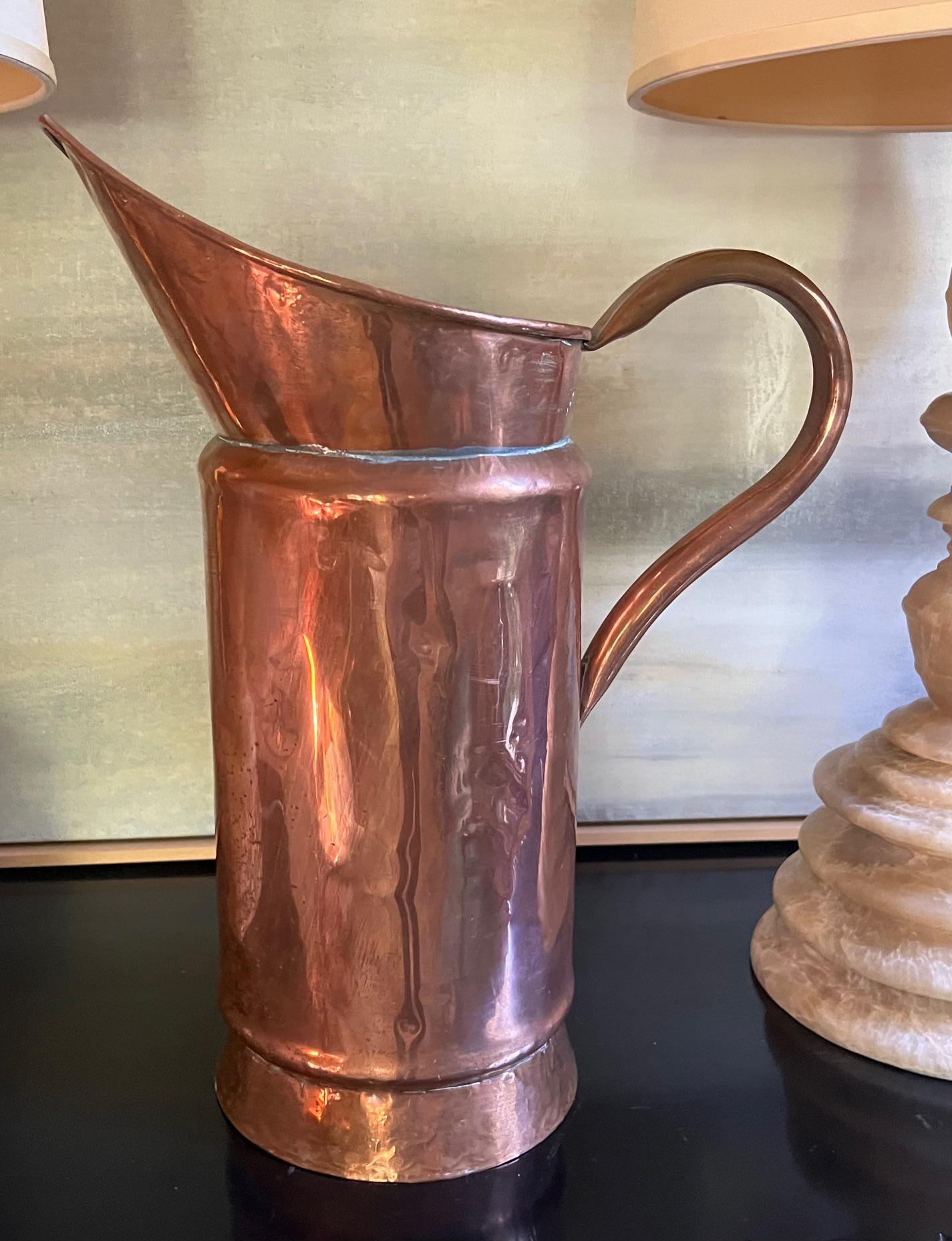 Extra large fully functional copper pitcher made in France around the 1930's.