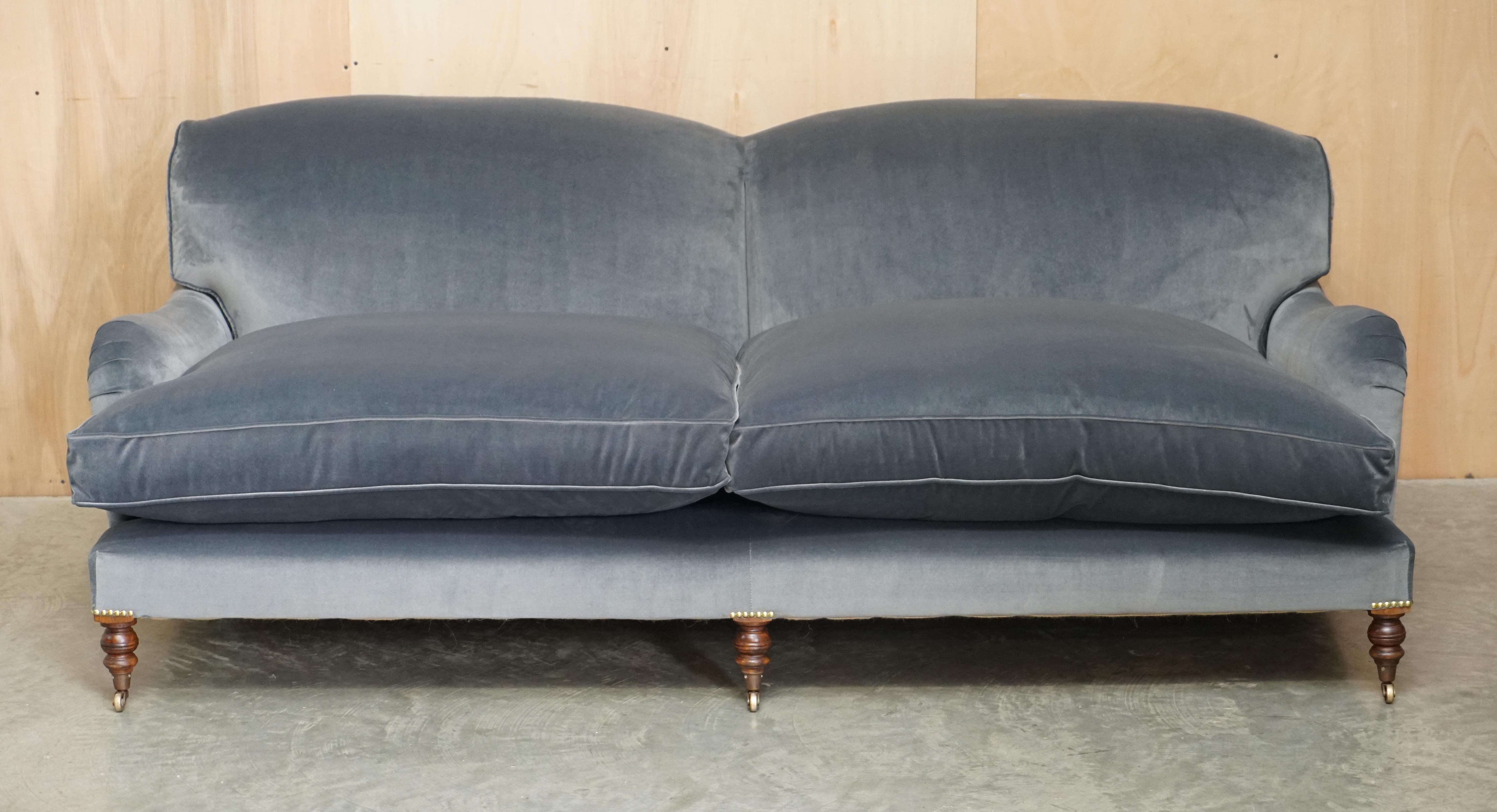 We are delighted to offer for sale this brand new, extra deep, George Smith Signature Scroll Arm large sofa with feather filled base cushions upholstered with the exceptionally luxury grey velvet

Please note the delivery fee listed is just a