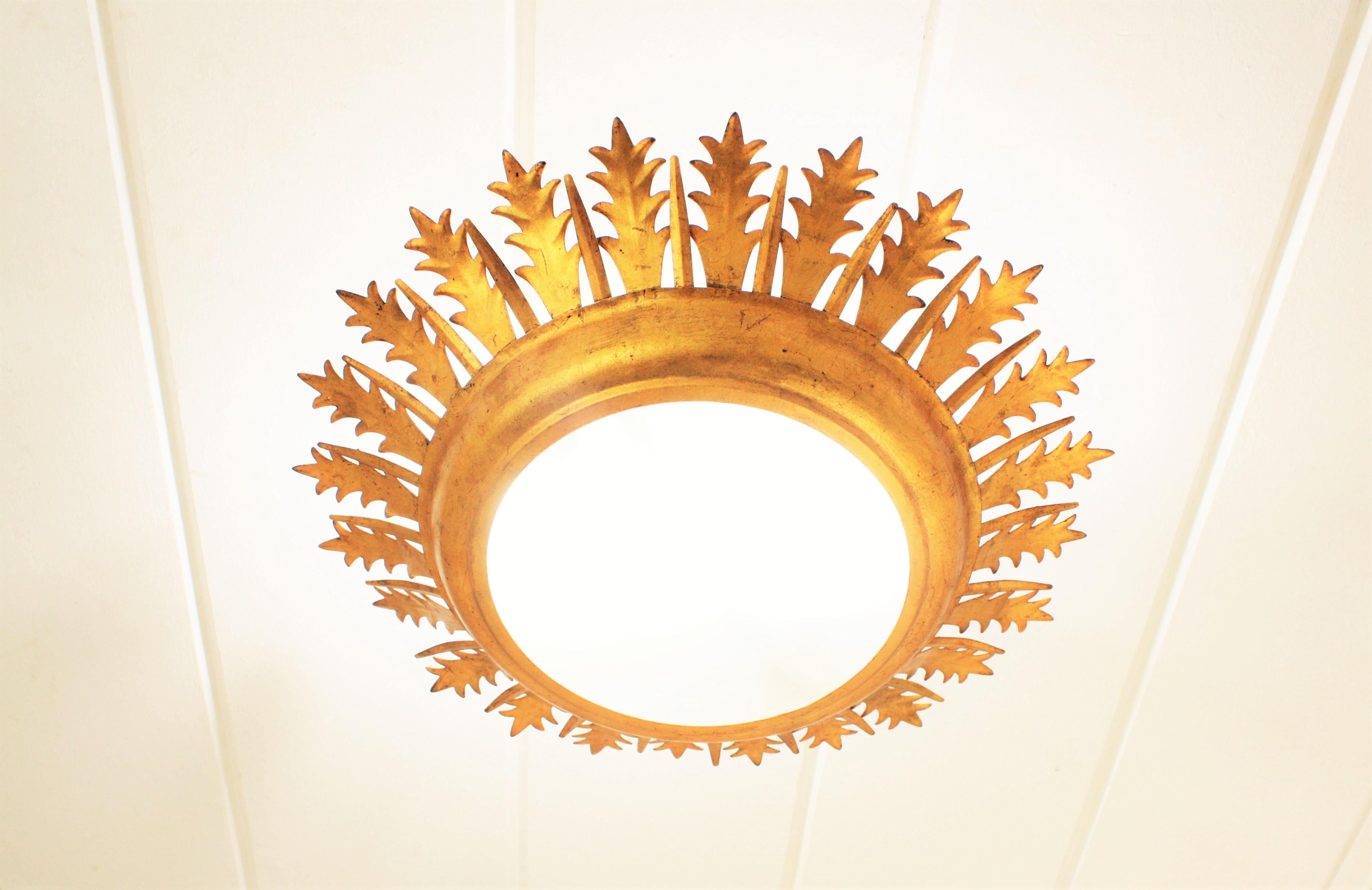 Mid-Century Modern Extra Large Gilt Iron Crown Sunburst Ceiling Light Fixture with Frosted Glass