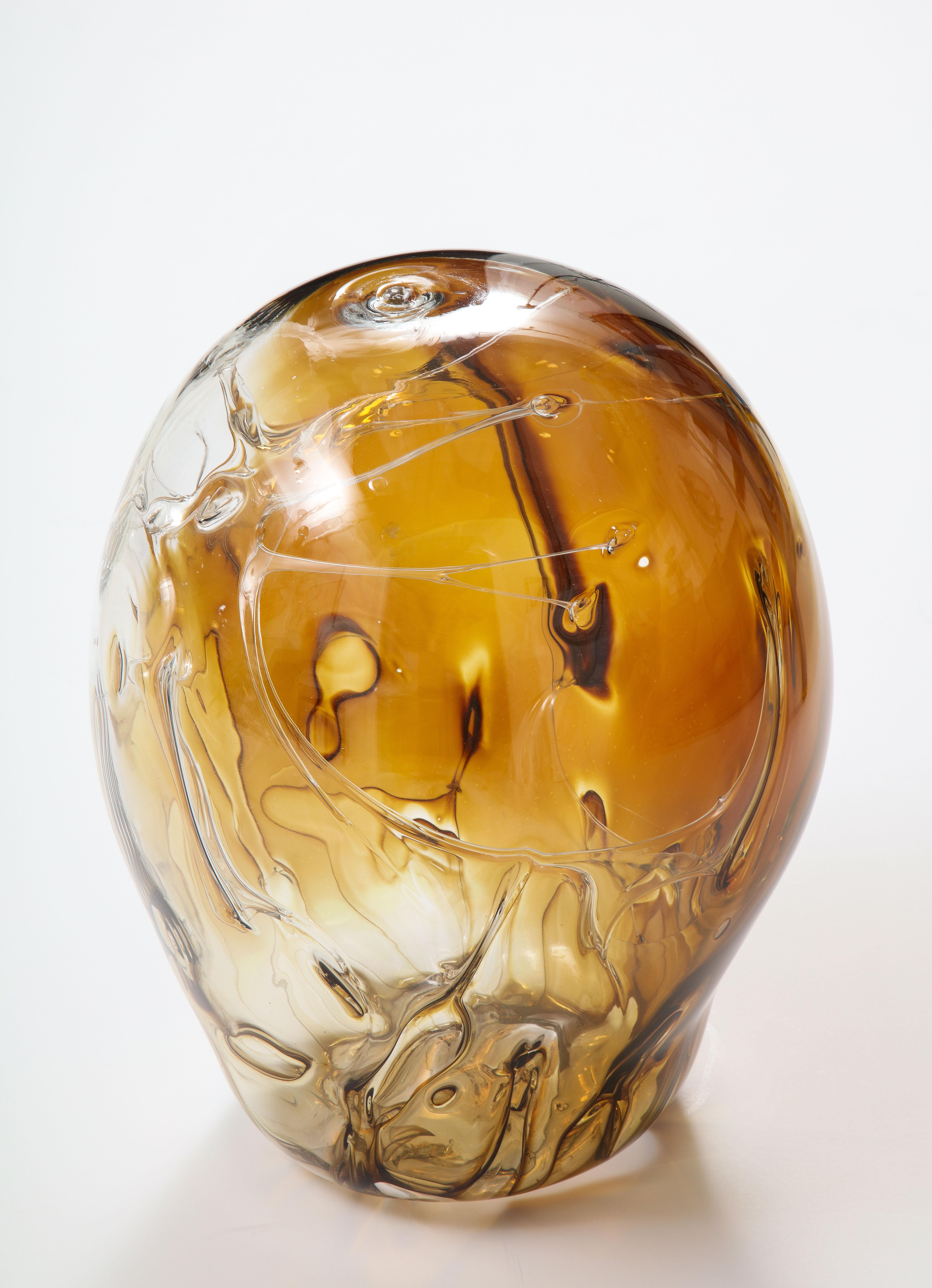 Extra large handblown glass sculpture by Peter Bramhall.
Rare color combination in tones of amber and brown with internal glass threads,
Signed and dated on the bottom.