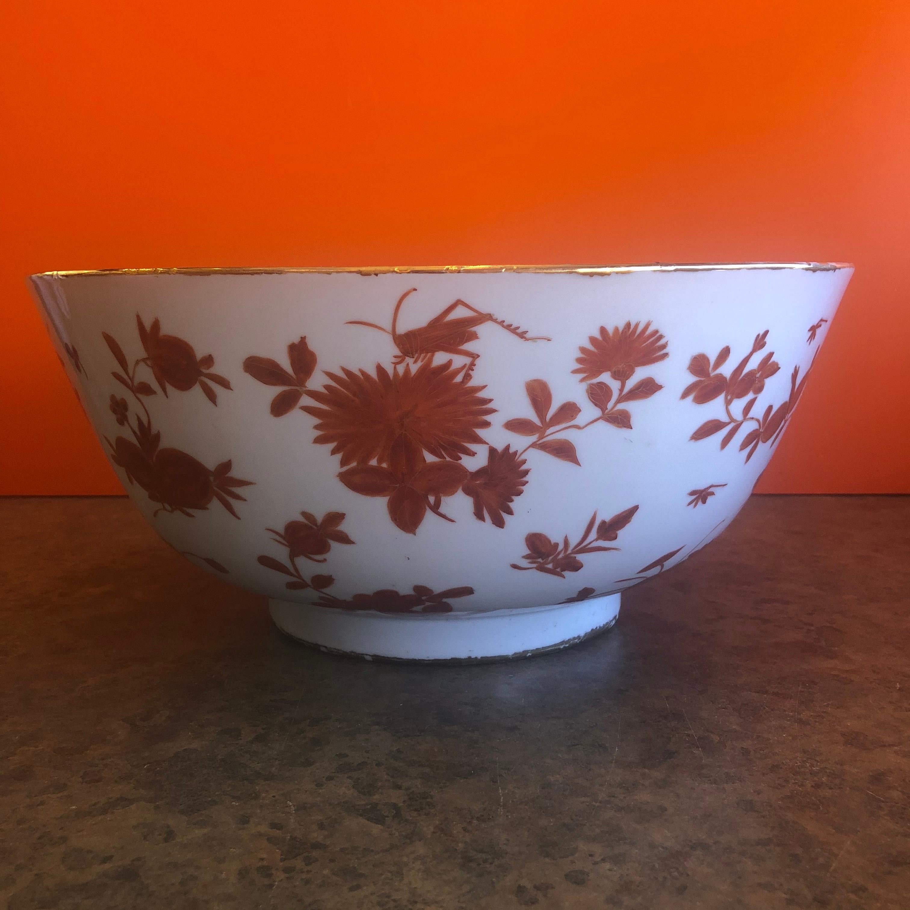 Extra large hand painted made in Hong Kong porcelain bowl from Gumps, circa 1970. This gorgeous bowl has a wonderful floral and grasshopper design and measures: 14.25