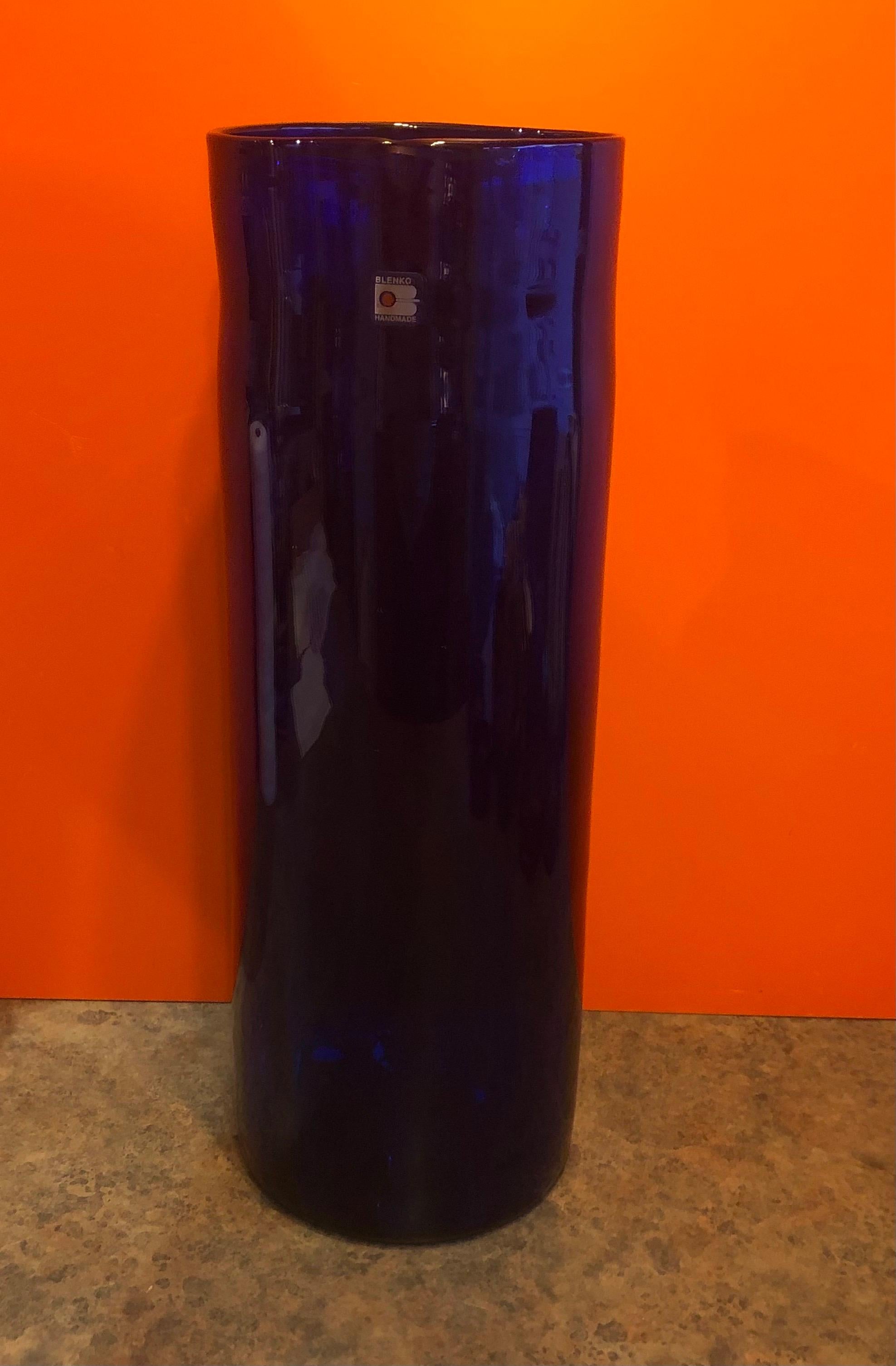 Extra large hand blown cobalt blue art glass vase by Blenko Glass, circa 1990s. This gorgeous statment piece is a beautiful example of American art glass. #1294