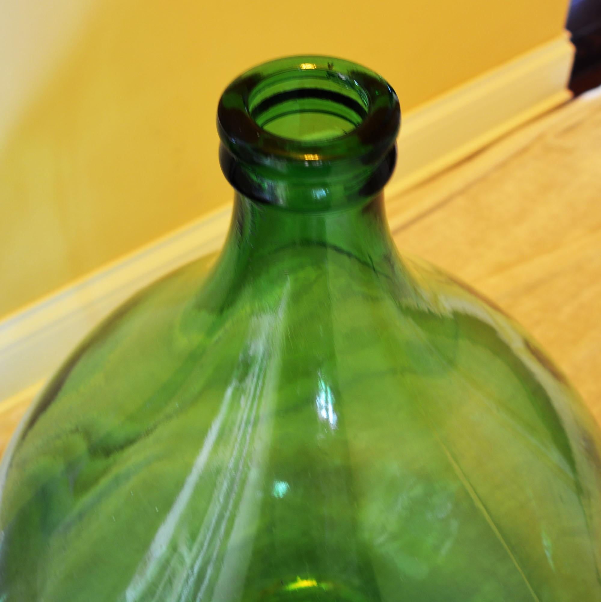 large green glass bottle vase