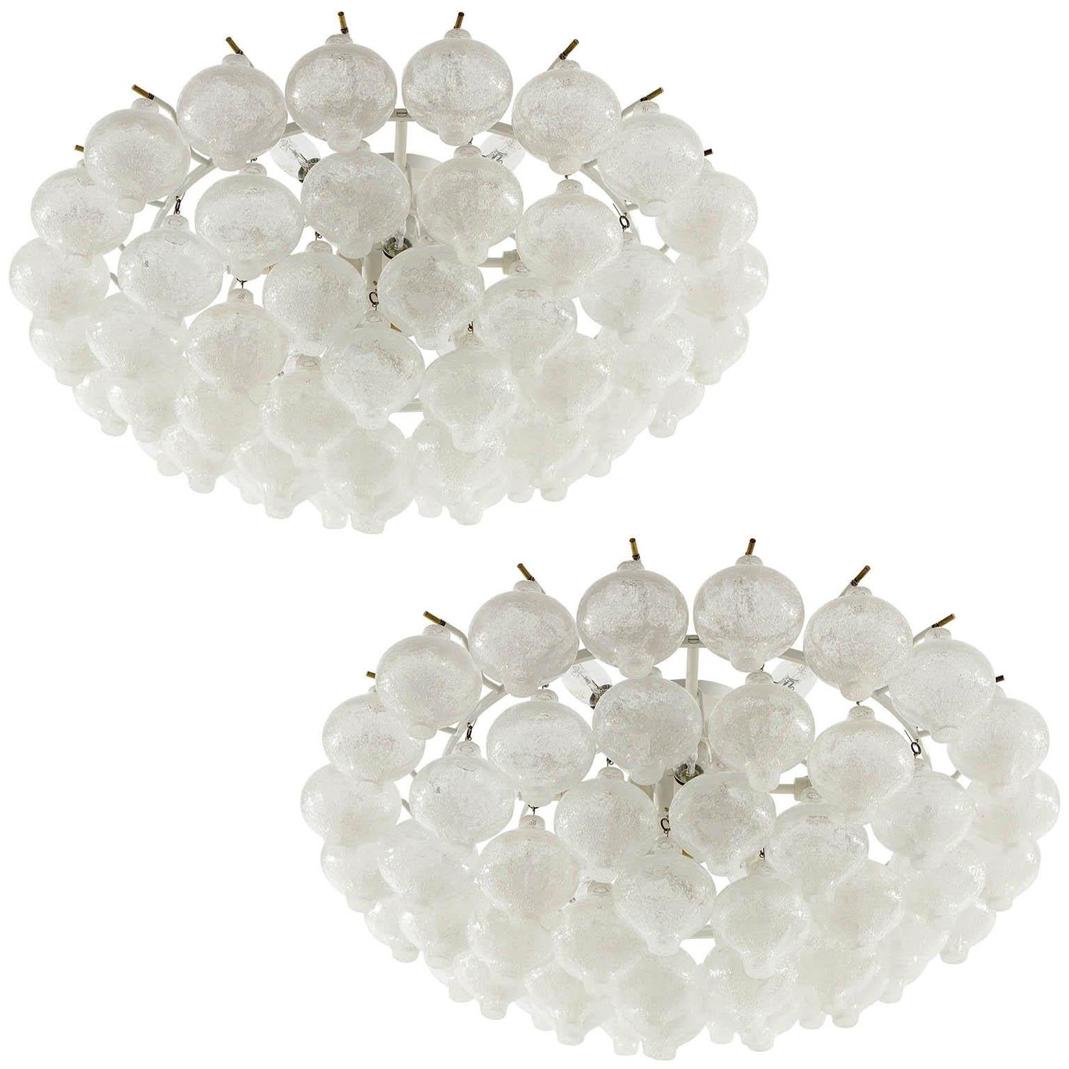 An extra large and gorgeous 'Tulipan' flush mount chandelier by J.T. Kalmar, Austria, Vienna, manufactured in midcentury, circa 1970 (late 1960s or early 1970s).
Only one light is available. The price is per light.
The name Tulipan derives from the