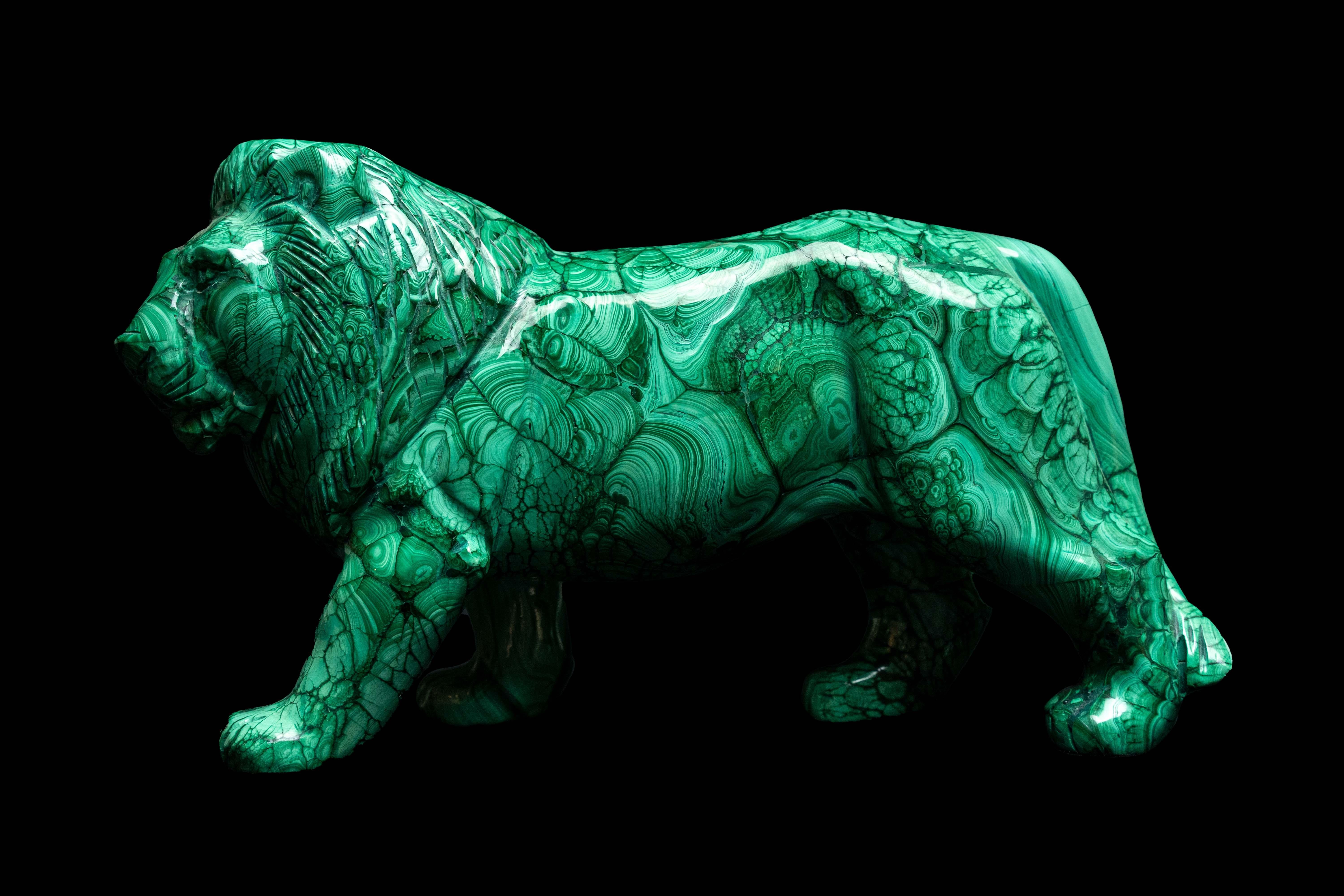 Extra Large carved Malachite Lion. This piece was hand carved in India out of one solid piece of malachite from the Congo. Malachite, known as the 