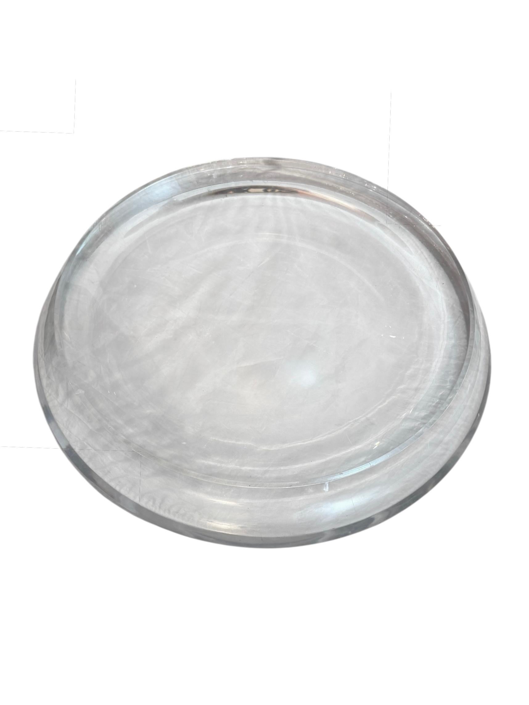 Make a bold statement with this stunning Extra Large Mid-Century Lucite Centerpiece. Featuring a sleek, sculptural design and exceptional clarity, this piece showcases the iconic minimalist aesthetic of the era. Its substantial size and thick-walled