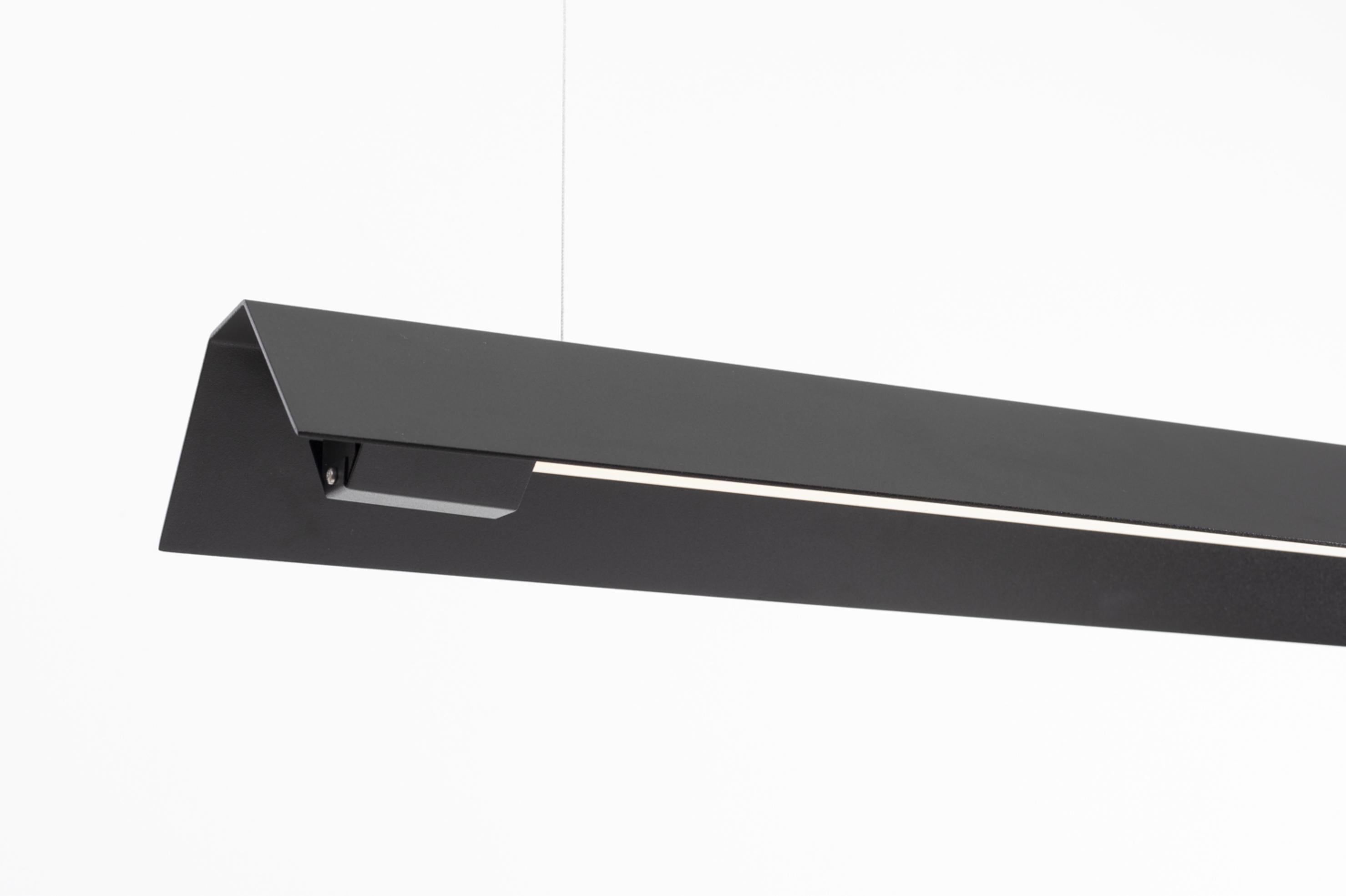 Extra Large Misalliance Ral jet black suspended light by Lexavala
Dimensions: D 16 x W 160 x H 8 cm
Materials: powder coated aluminium.

There are two lenghts of socket covers, extending over the LED. Two short are to be found in Suspended and