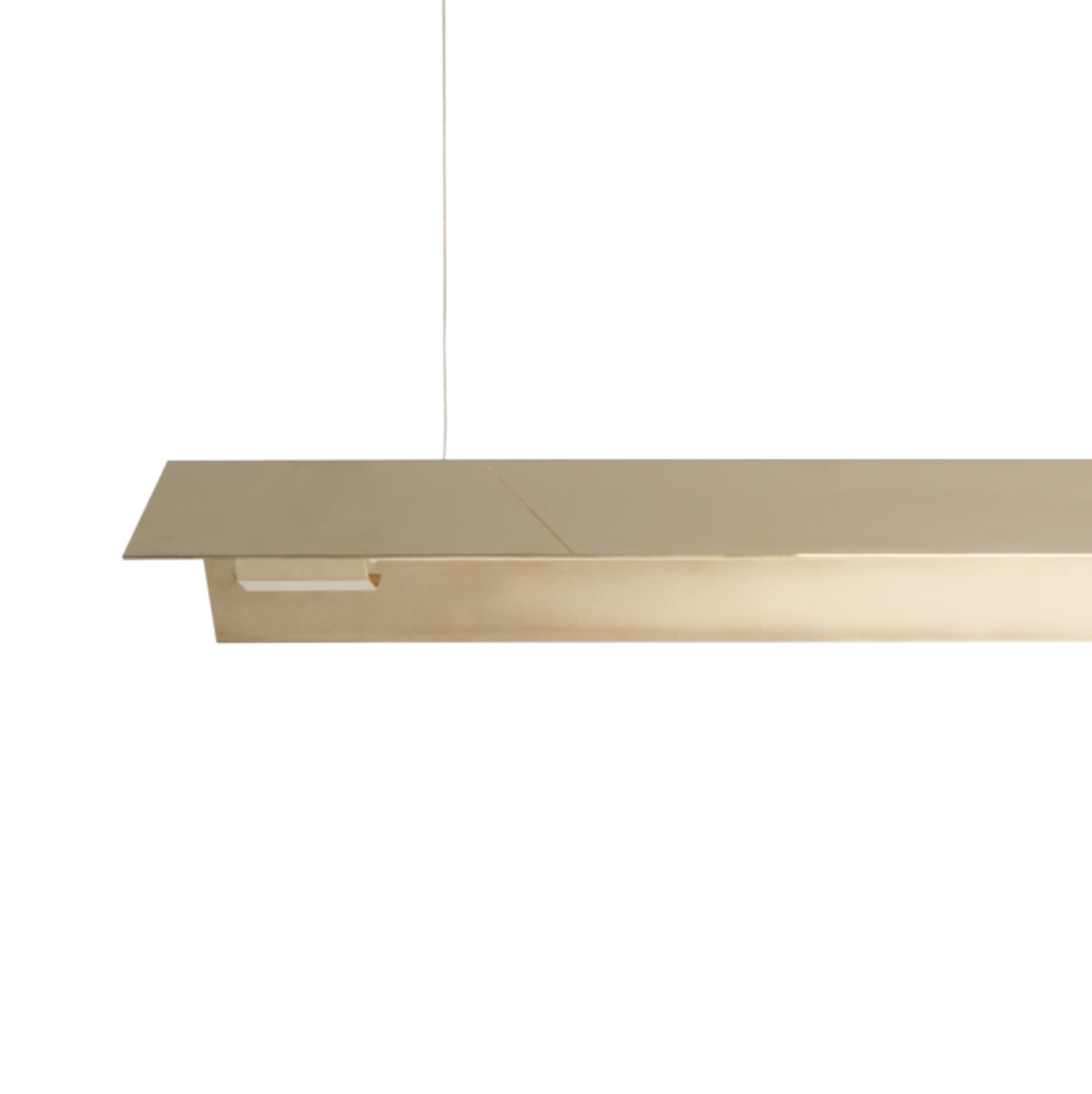 Extra large Misalliance solid brass suspended light by Lexavala
Dimensions: D 16 x W 160 x H 8 cm
Materials: Brass.

There are two lenghts of socket covers, extending over the LED. Two short are to be found in Suspended and Surface, and one long