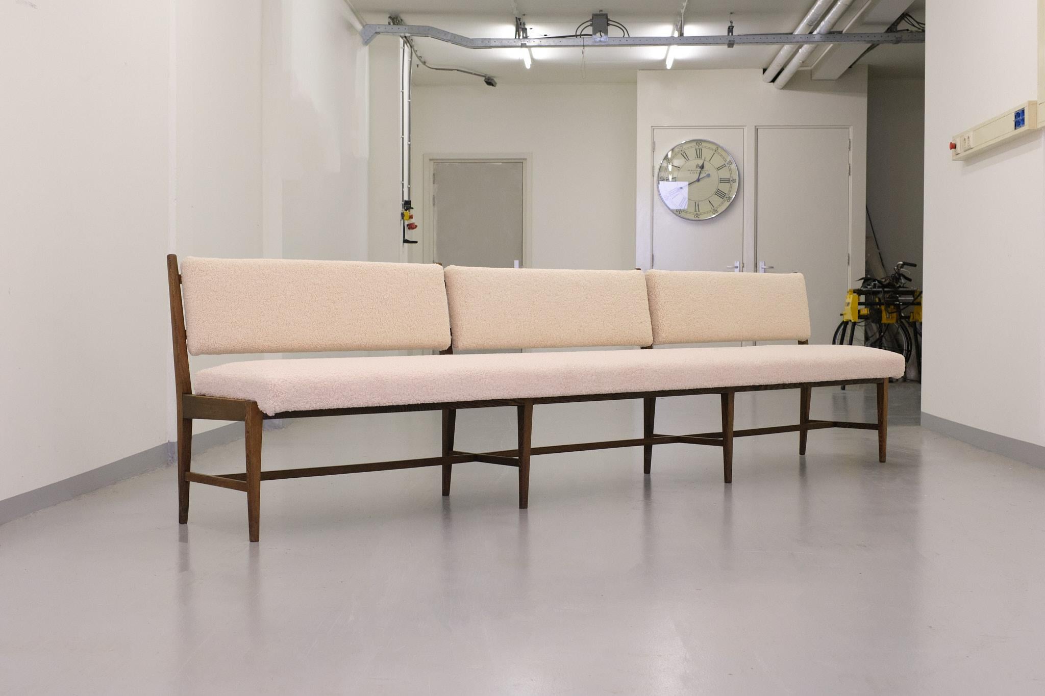 Exceptionally Large Modernist sofa Width 123.2 inch = 313 cm Brand new Sheepskin like upholstery. The frame is made of solid Wengé. Nice minimalist design.
 