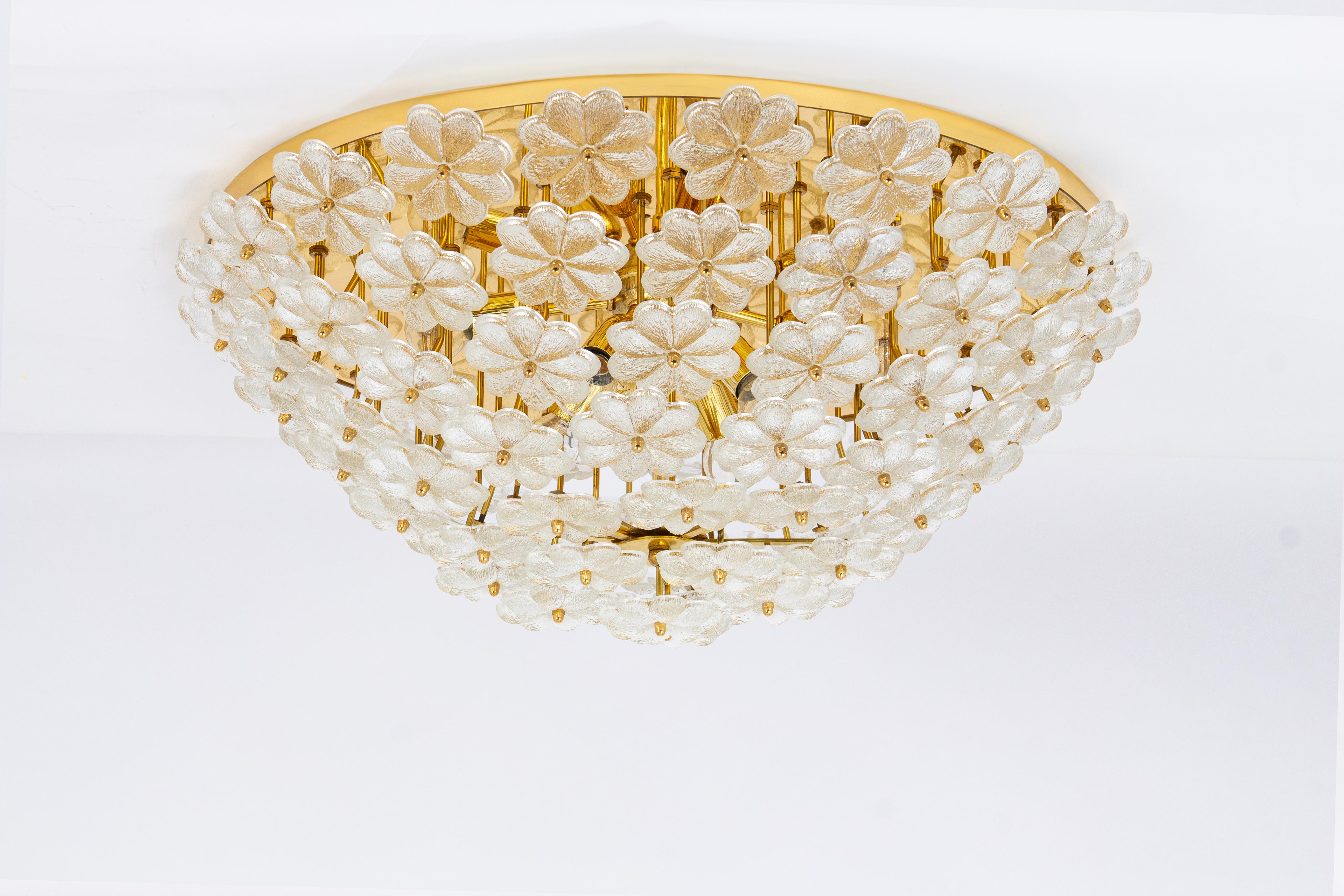 A Huge Midcentury flush mount light with many Murano glass flowers over a polished brass base, made by Ernst Palme in Germany in 1970s.
Very rare.
High quality and in very good condition. Cleaned, well-wired and ready to use. 

The fixture requires