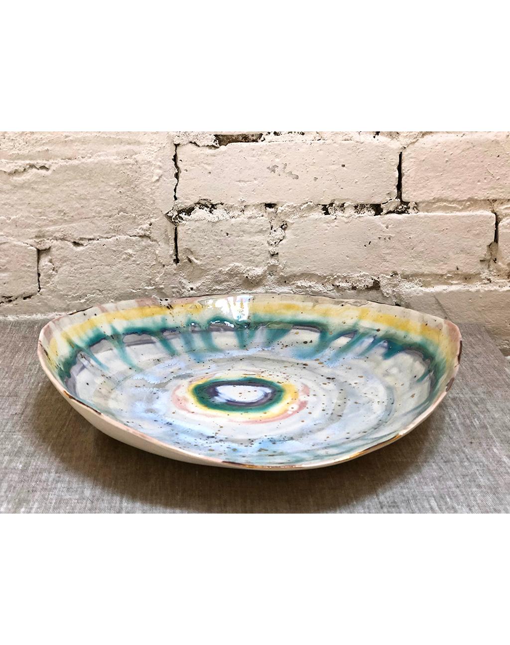 This extra large prism platter by Minh Singer is handbuilt in porcelain and intricately glazed with a rainbow of celadon glazes and 22-karat gold and mother-of-pearl lusters. Singer's mesmerizing glaze technique requires several firings.

Each