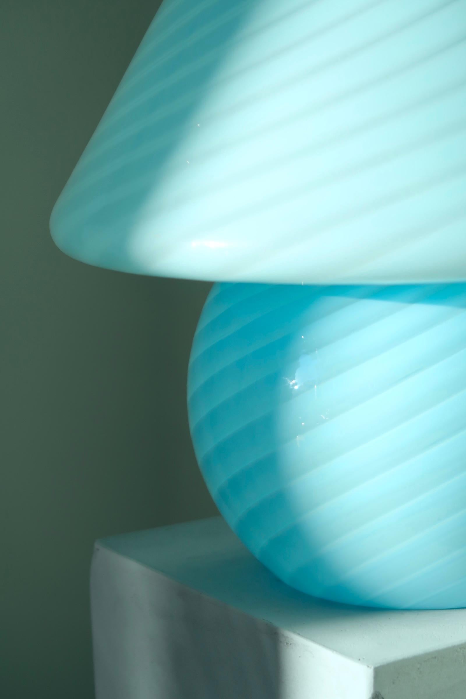 Extra large vintage Murano mushroom lamp in a nice baby blue shade. The lamp is mouth-blown in one piece of swirled glass and has an impressively large size. Handmade in Italy, 1970s, and has original Murano Vetri label.
??H:37 cm D:33 cm.

 
