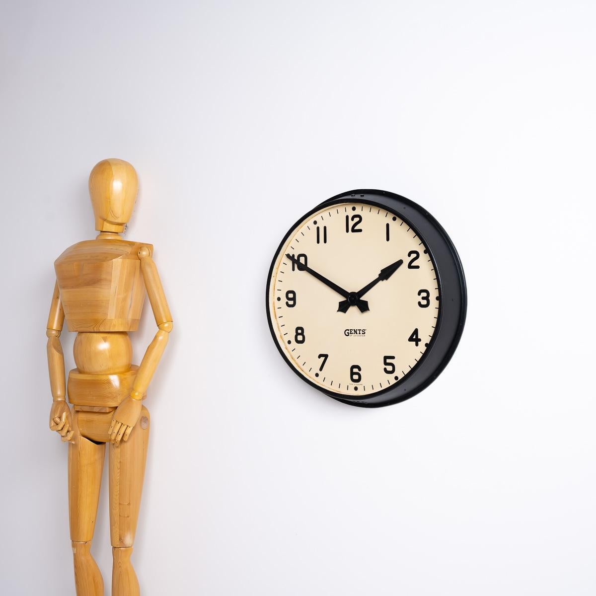 Large Antique Station Clock by Gents of Leicester
An exceptional steel railway station clock by English clock maker Gents of Leicester circa 1940.

Stunning industrial design with steel casing retaining the original aged black paint and beautiful