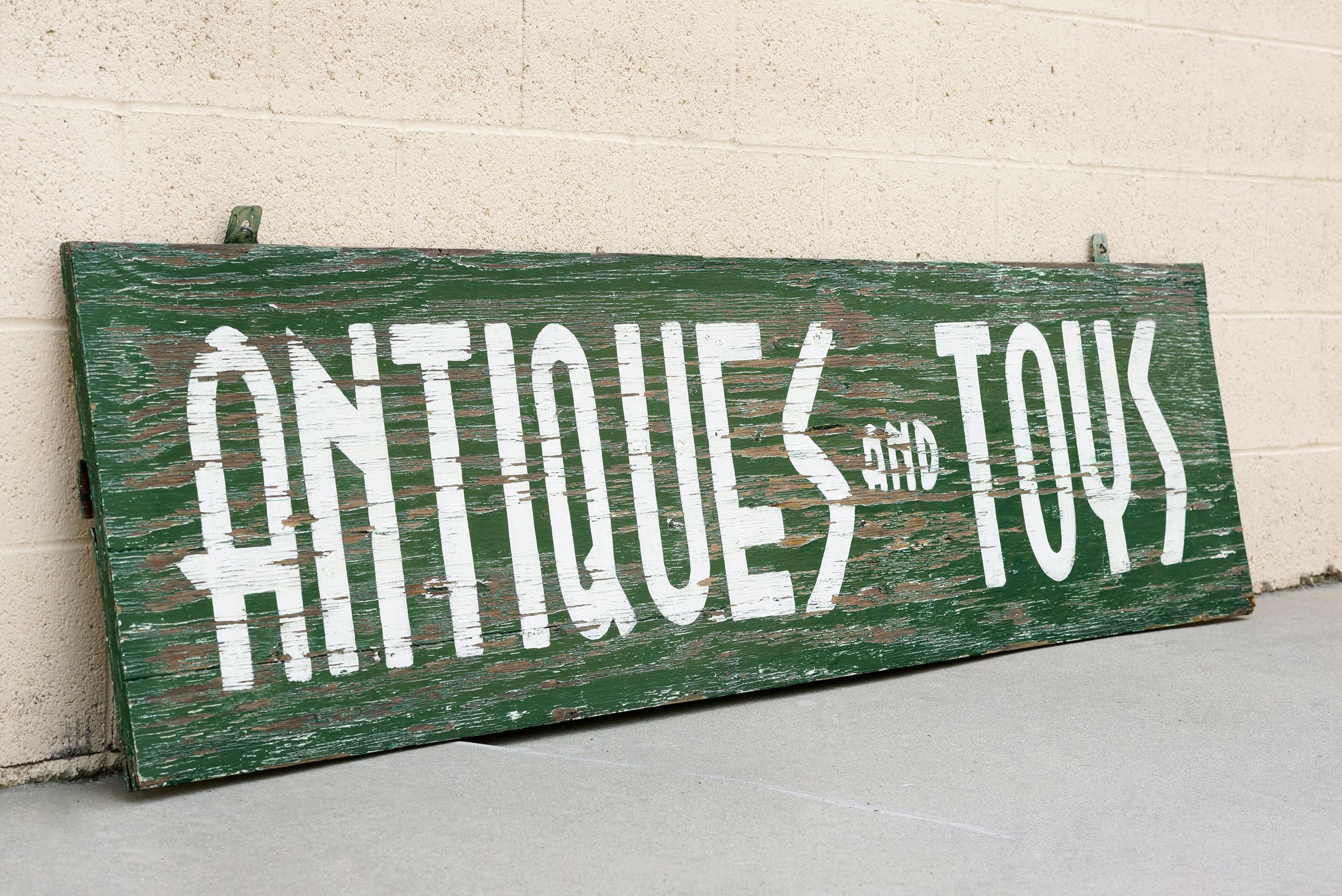 Extra large hand-painted storefront signage reclaimed from beloved 