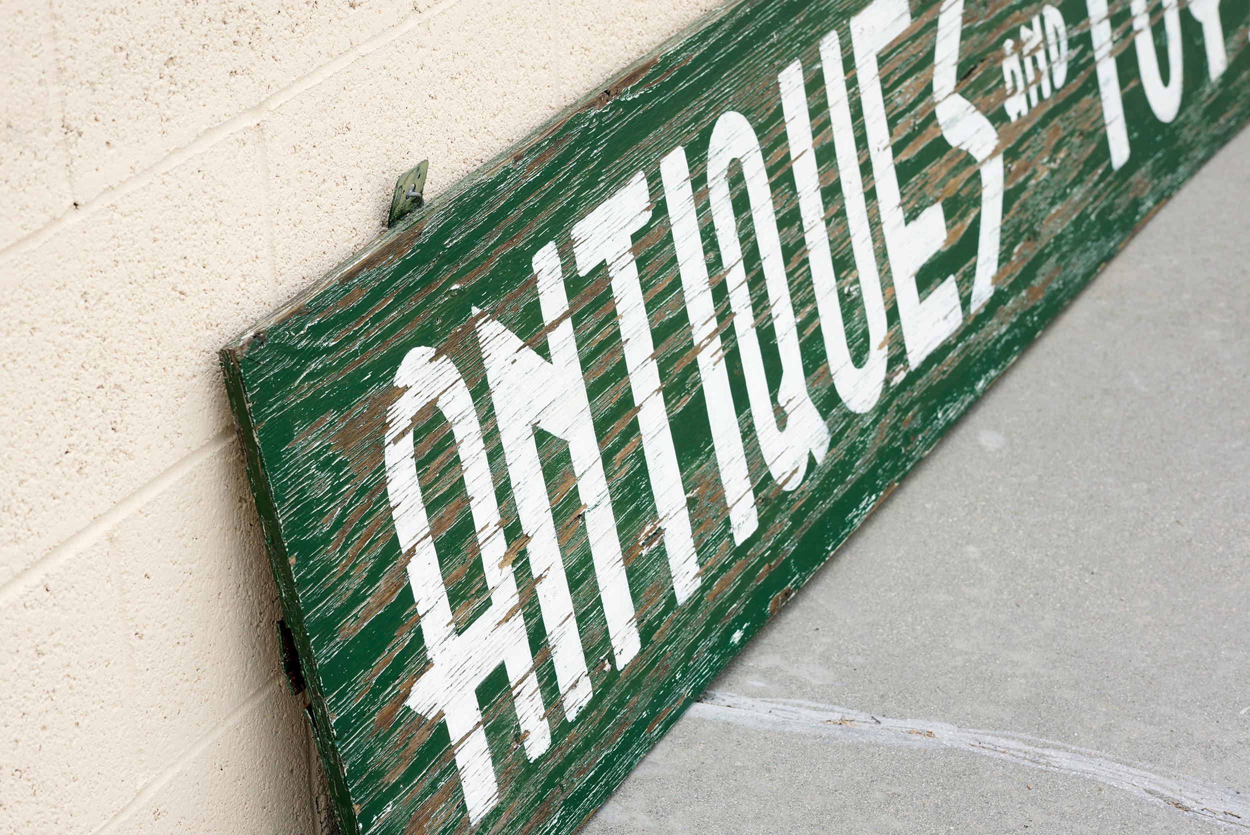 Extra Large Sign From Antiques and Toys Storefront, Hand-Painted In Distressed Condition For Sale In Alhambra, CA