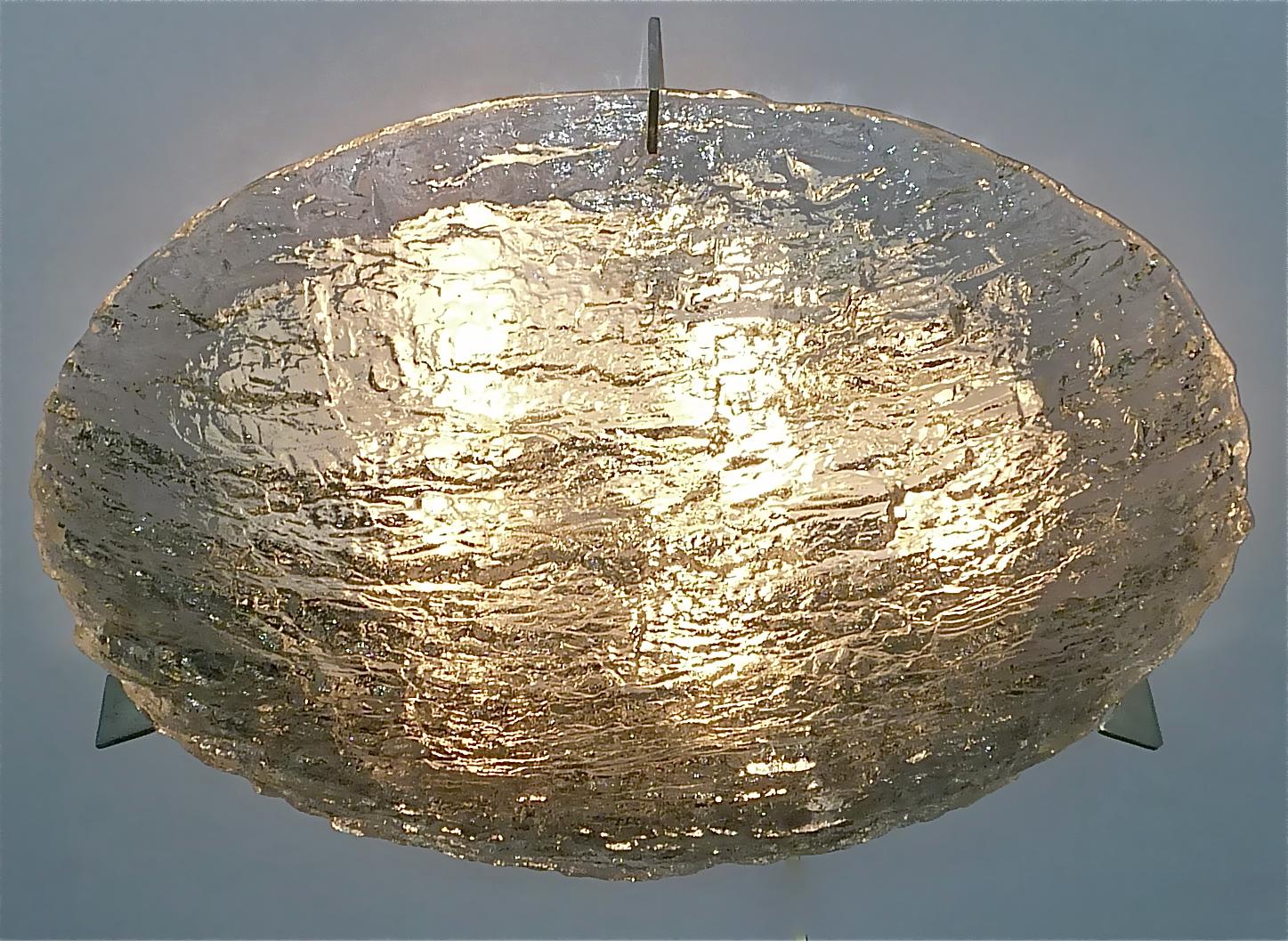 Awesome signed Kaiser multifunctional flush mount / ceiling lamp or wall lamp, Germany, circa 1960. The extra large lamp which has still the decal company label Kaiser Leuchten with model number on reverse is made of frosted Murano ice glass, white