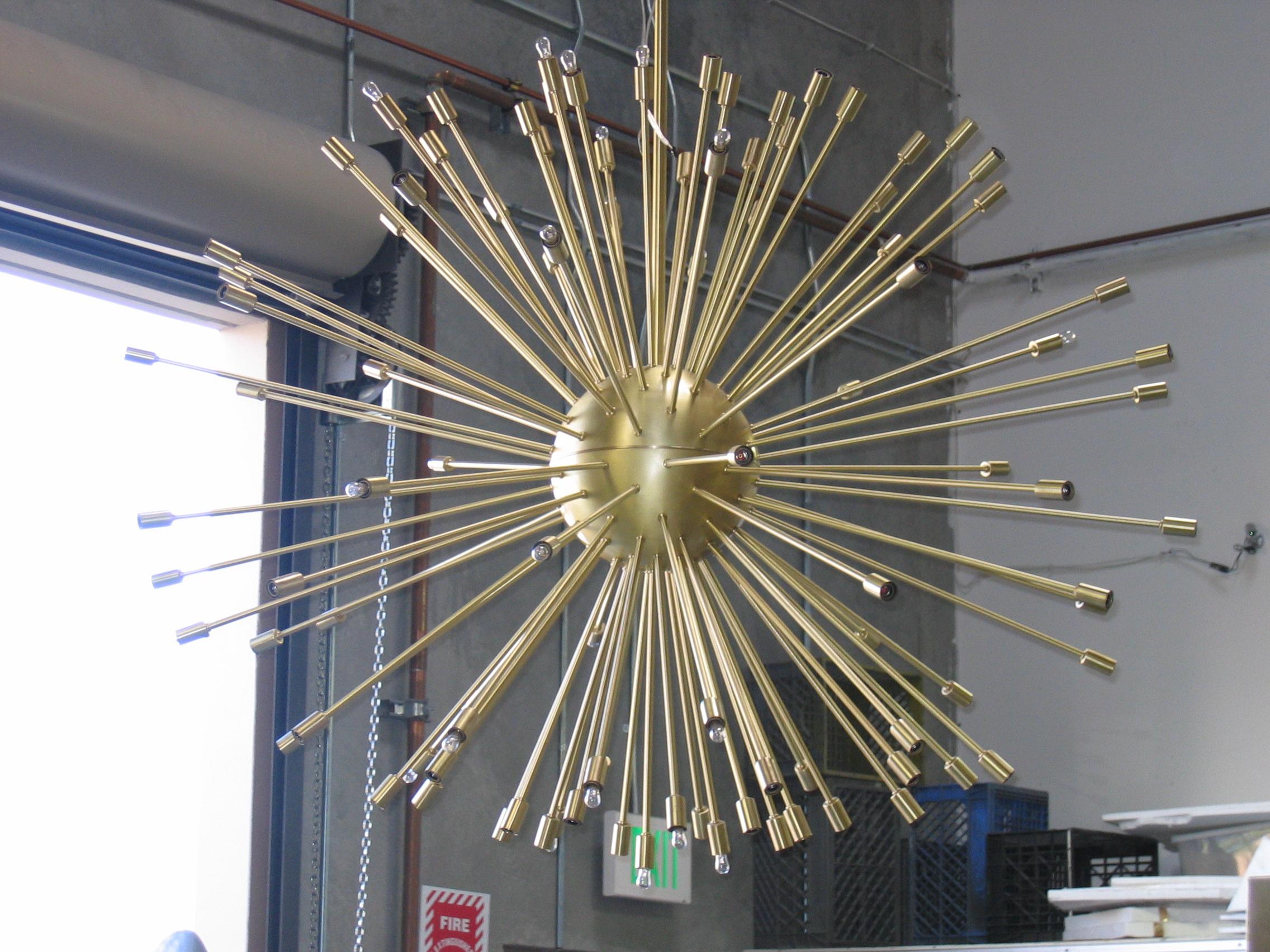 A Fantastic Custom Designed Large Sputnik . Made for a Lighting showroom in Los Angeles . Constructed of all solid Brass parts . There are 101 candelabra sockets .  Comes in at an appox diameter of 60