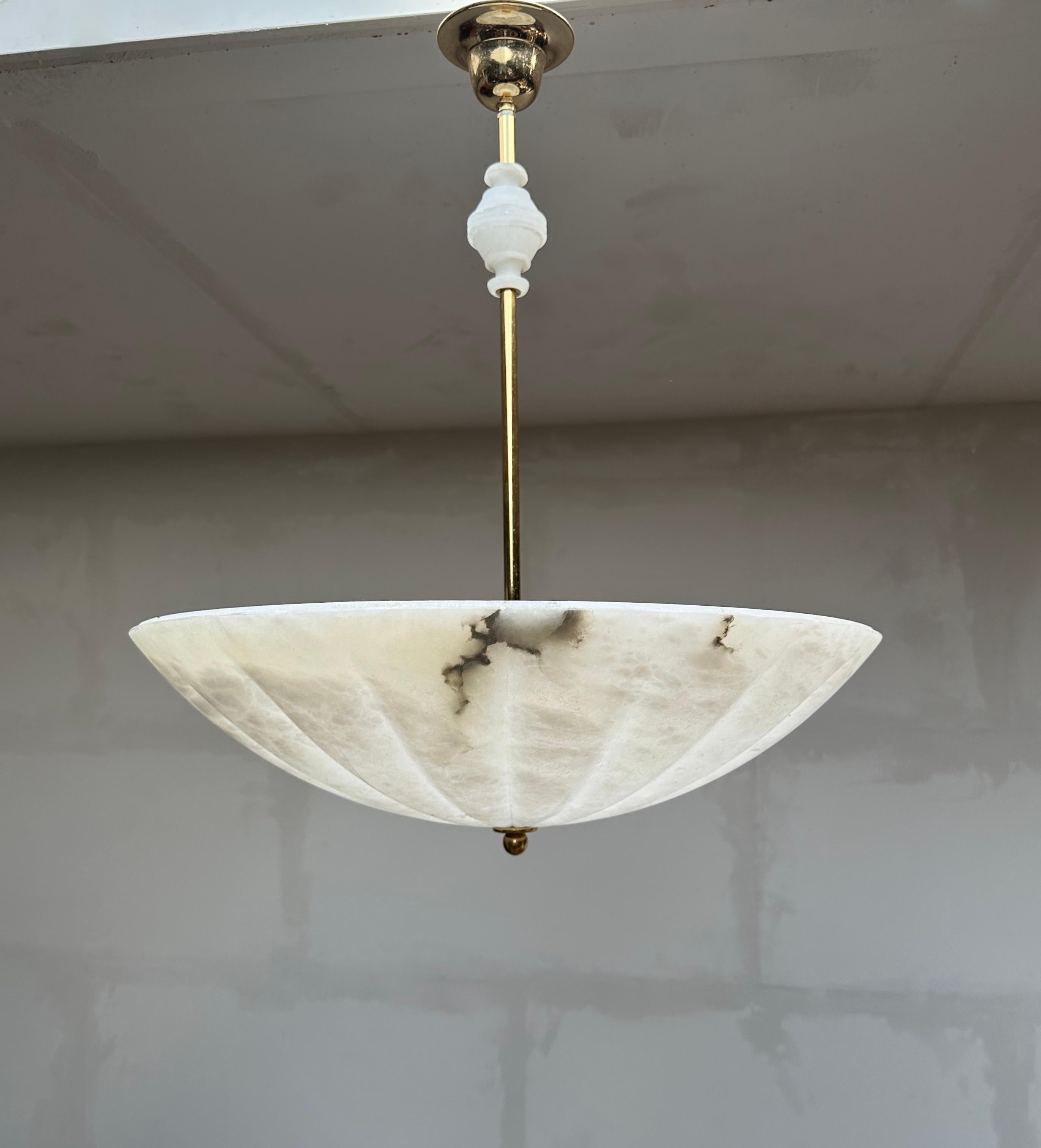 Remarkable, Midcentury modern design and Art Deco style alabaster light fixture.

For the collectors of rare and stylish design light fixtures of wonderful materials we also have this large and great looking 'upside down umbrella pendant light'.