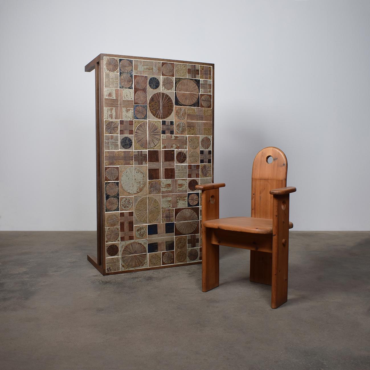 Tue Poulsen's ceramic coffee tables are celebrated for their striking combination of sculptural design and functional artistry. This particular piece features a handcrafted ceramic tile top, showcasing Poulsen's signature organic textures and earthy
