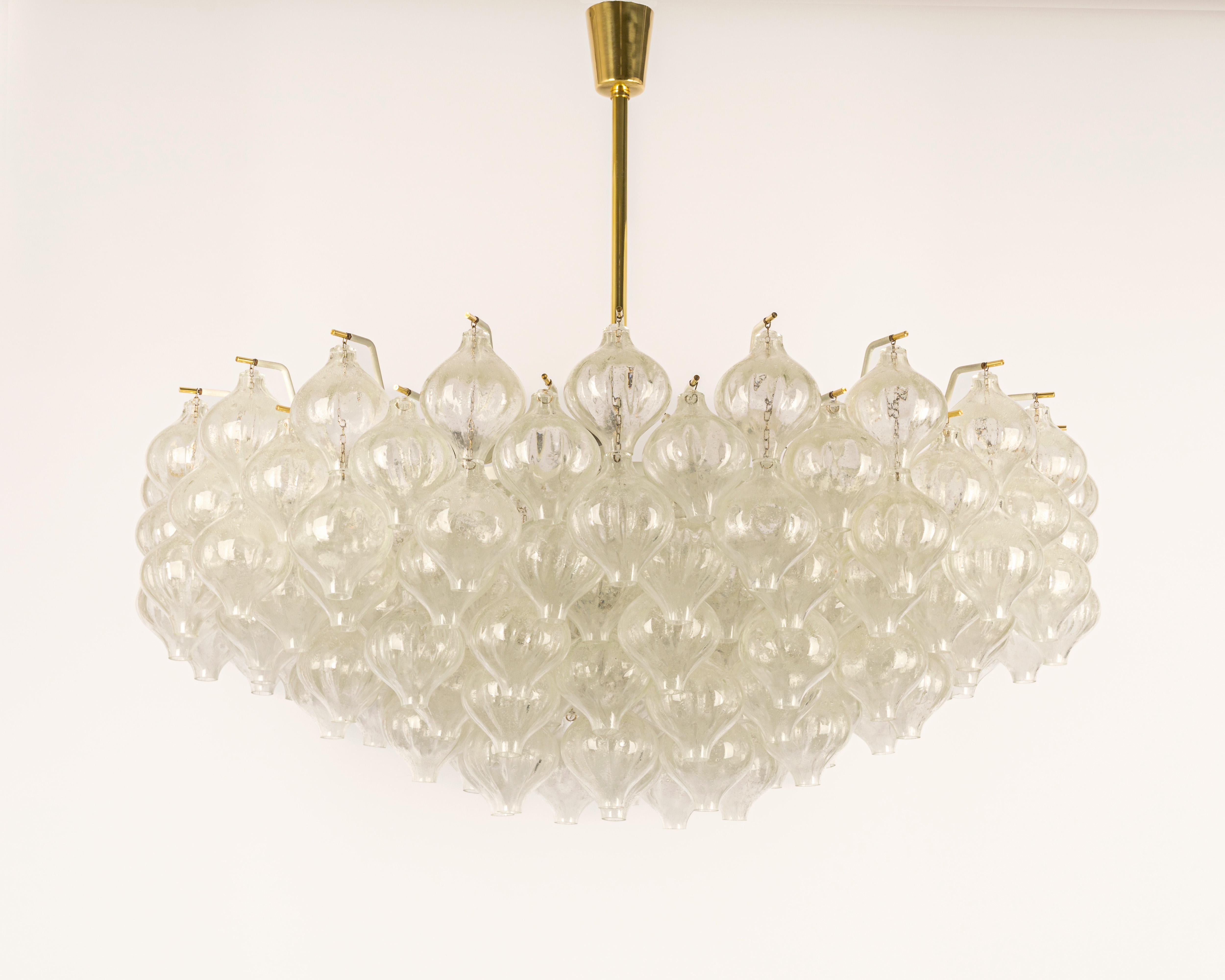 Wonderful onion-shaped -Tulipan glass chandelier. 155 hand-blown glasses suspended on a white painted metal frame.
Best of design from the 1960s by Kalmar, Austria. High quality of the materials.

Sockets: The chandelier takes 28 small screw base