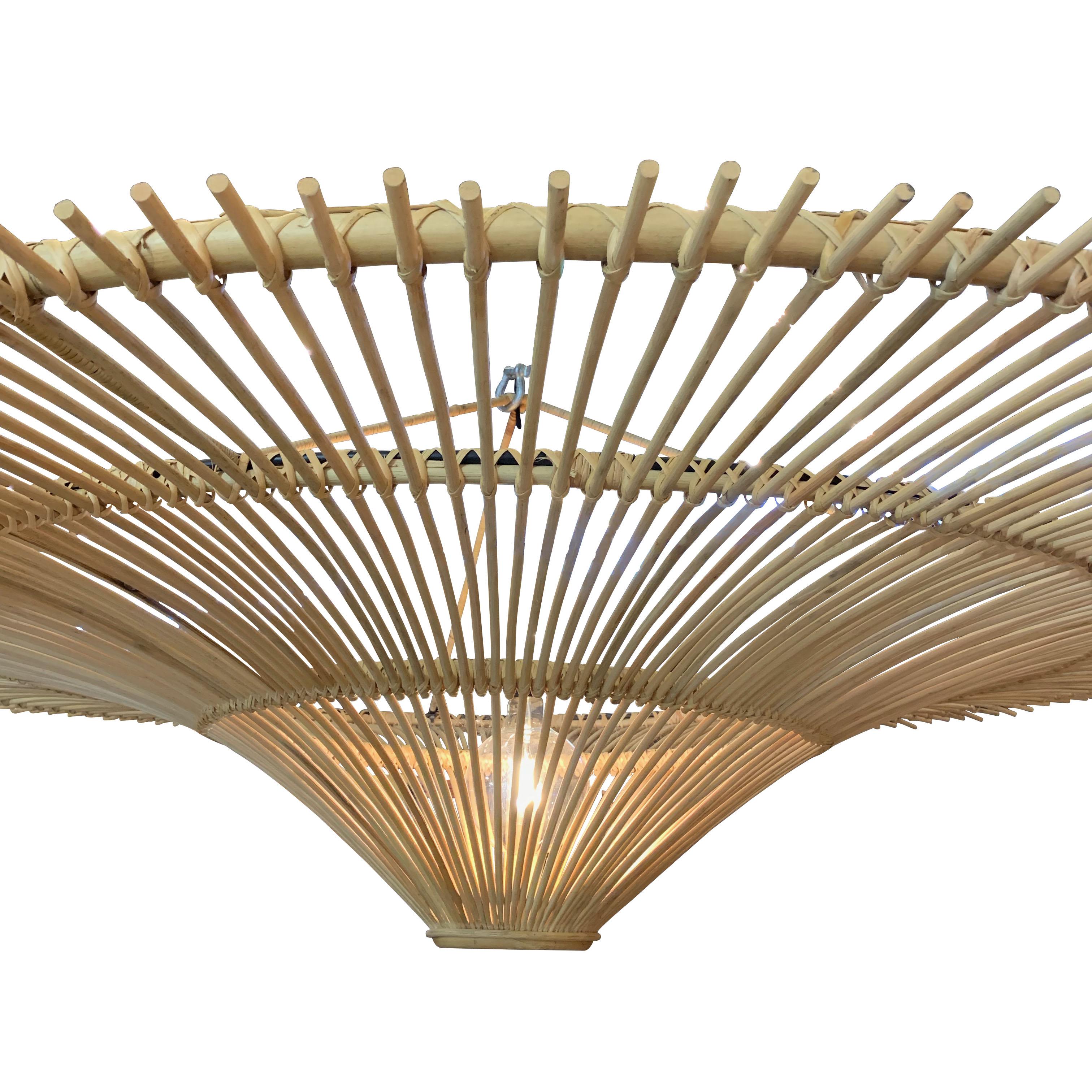Contemporary Indonesian extra large round umbrella shaped chandelier made of bamboo.
Single bulb.
60 watt to 150 watt maximum.

Also available in two additional sizes
Measures : L976 32
