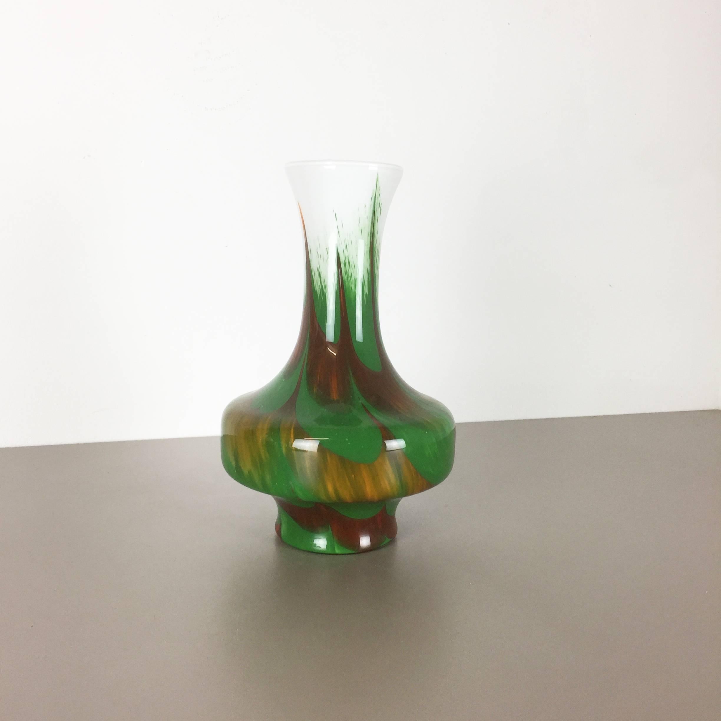 Article:

Pop art vase


Producer:

Opaline Florence


Design:

Carlo Moretti



DECADE:

1970s


Description:

Original vintage 1970s pop art handblown vase made in Italy by Opaline Florence. This vase was designed by Carlo