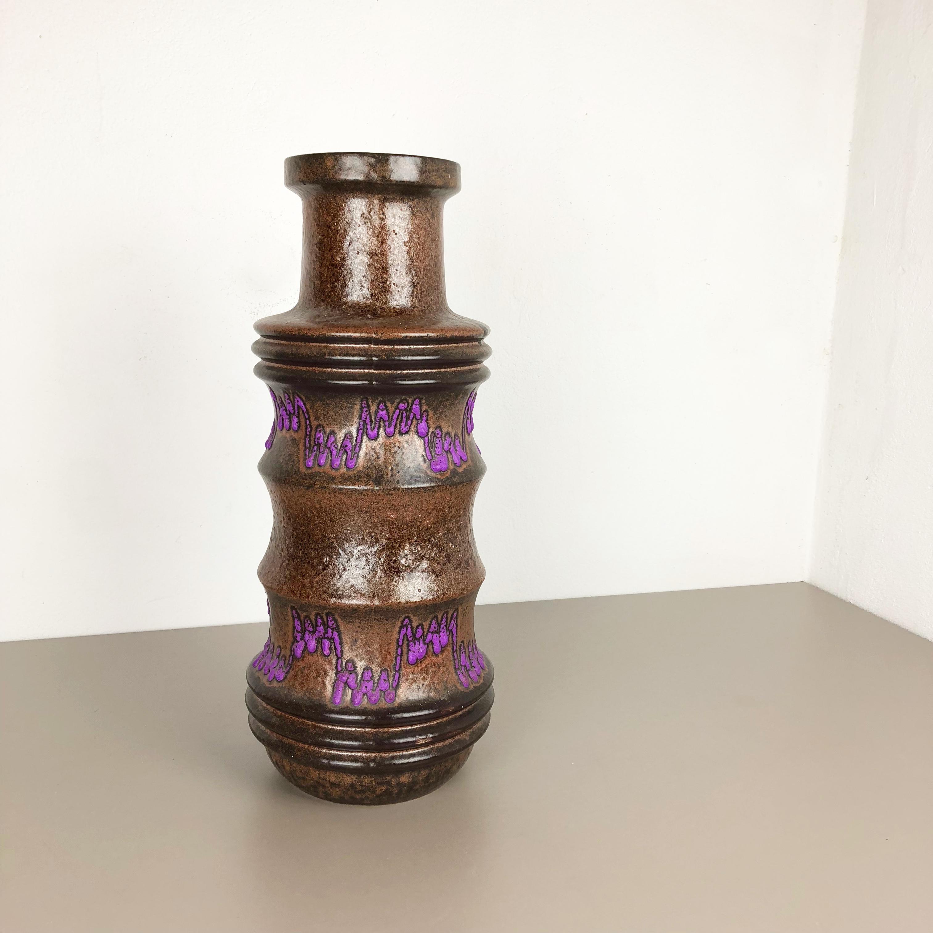Article:

Fat lava art vase



Producer:

Scheurich, Germany



Decade:

1970s


Description:

This original vintage vase was produced in the 1970s in Germany. it is made of ceramic pottery in fat lava optic. Super rare in this