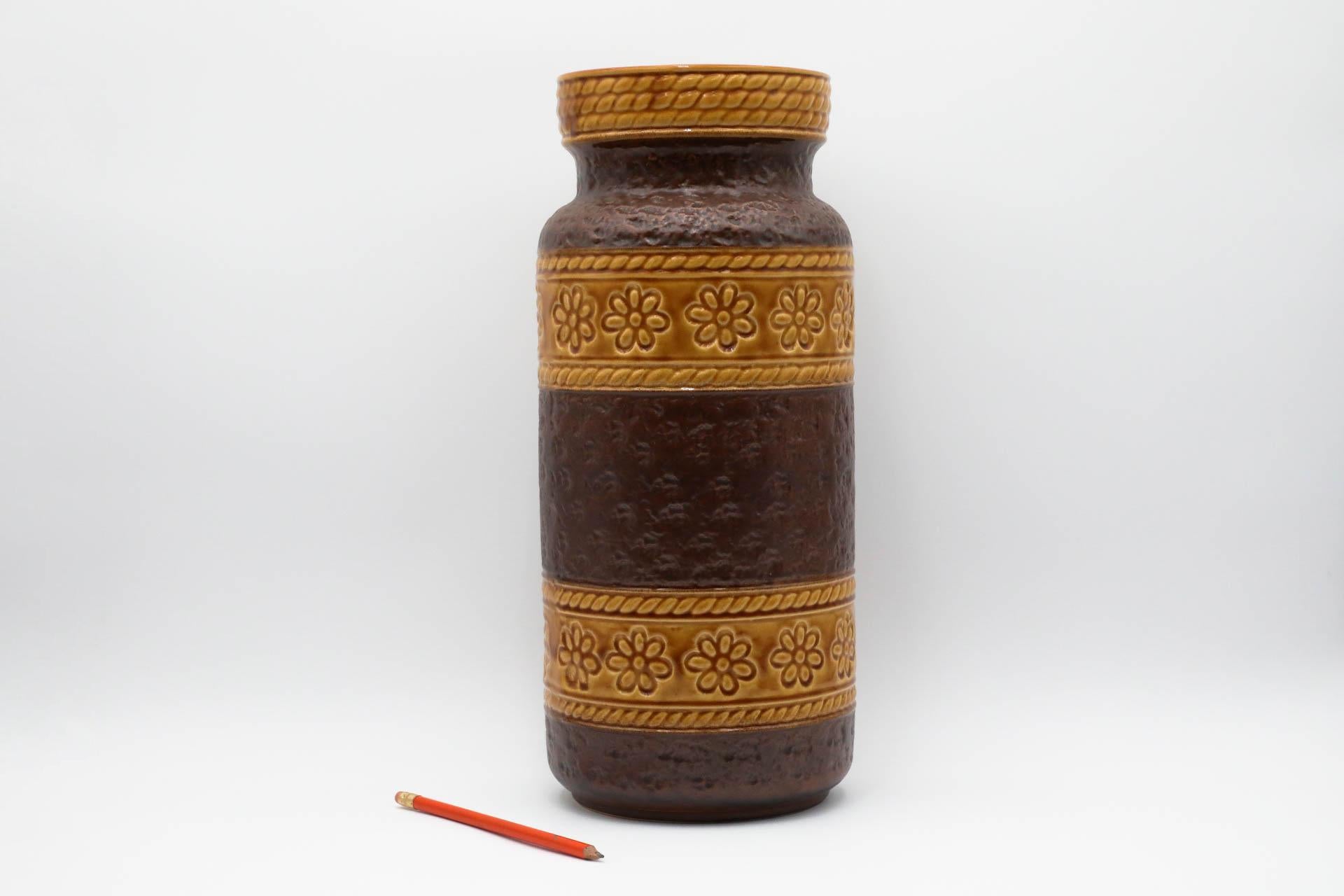 Beautiful West German floor vase. Marked '660 40' on bottom. Regarded as the golden age of ceramics, highly collectable 1950s-1970s Art Pottery is known for experimental and exploratory glazes, shapes, colors, and forms. With over 100 manufacturers