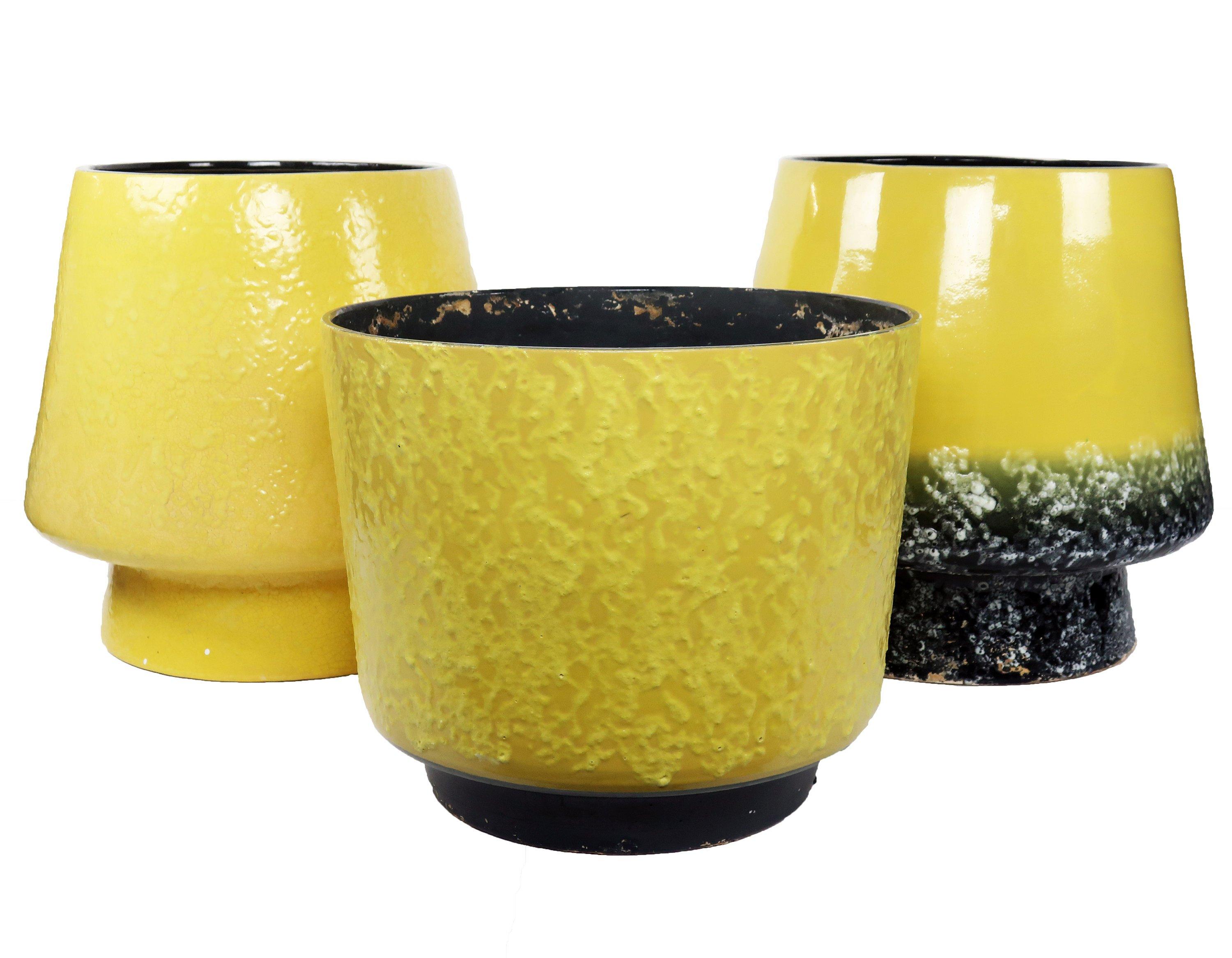 A stunning extra large Mid-Century Modern ceramic planter in the “Fat Lava” style (a very tactile textured exterior) with a bright yellow glaze. 

In good vintage condition with a few chips to glaze on one side. (See photos.)

18