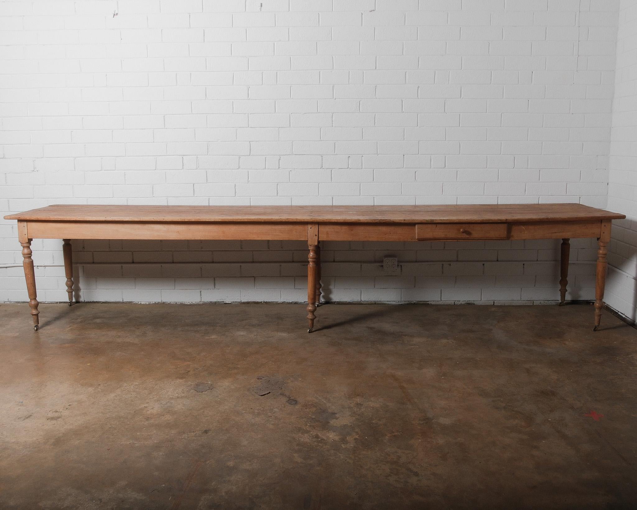 Extra-Long 19th Century French Pine Farmhouse Table with Drawers and Casters For Sale 3