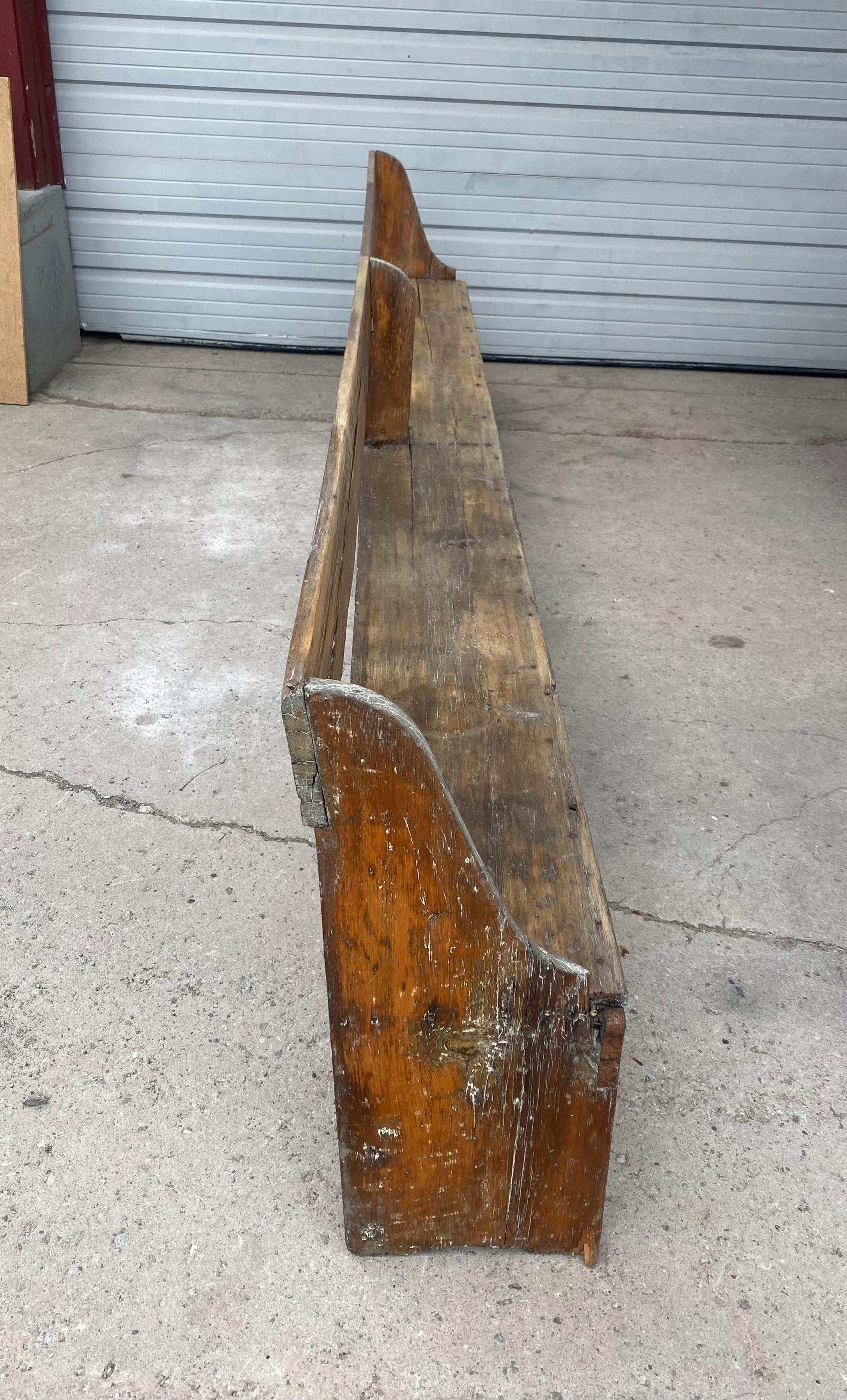 Extra long 19th Century single plank primitive bench, over 11 foot long. 2