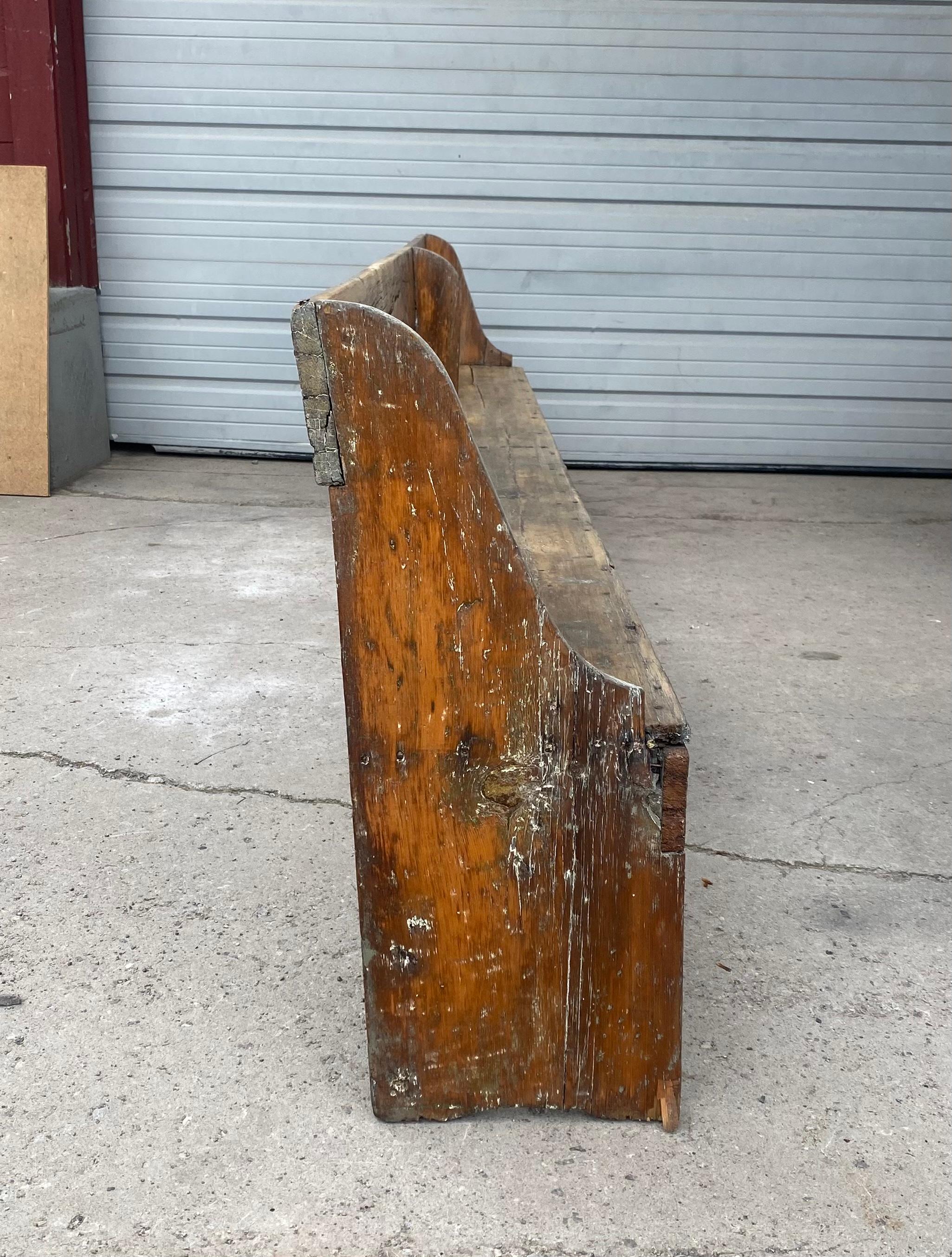 American Extra long 19th Century single plank primitive bench, over 11 foot long.