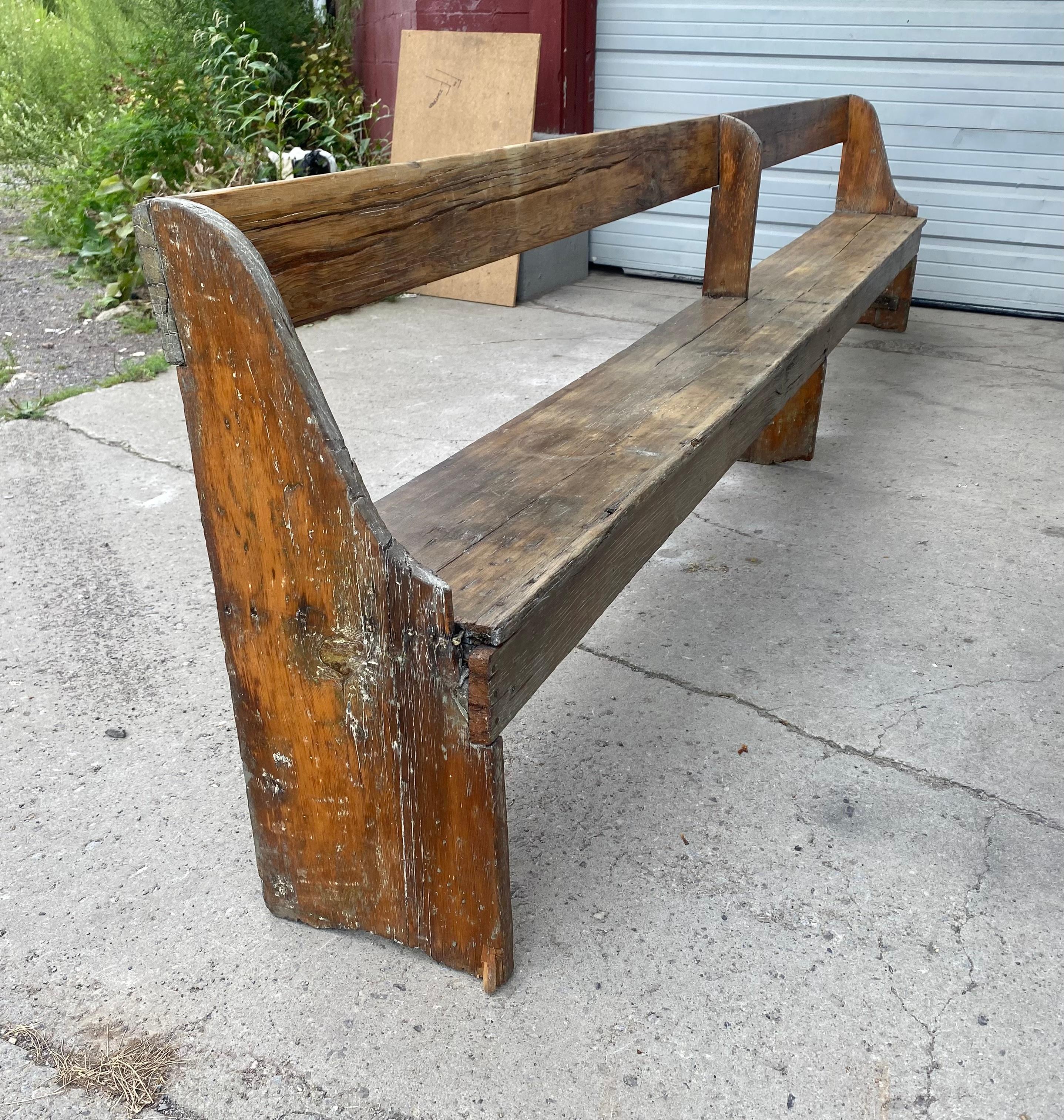 Hand-Crafted Extra long 19th Century single plank primitive bench, over 11 foot long.