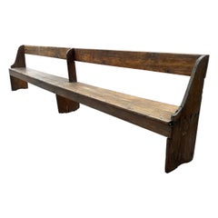 Antique Extra long 19th Century single plank primitive bench, over 11 foot long.