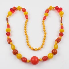 Extra Long Bakelite Lucite Necklace Warm Orange Yellow Colors