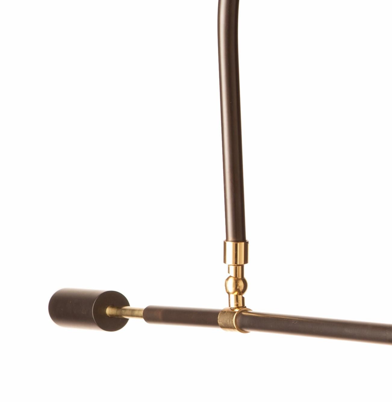 Brass Extra Long cantilevered Swing Arm wall sconce with Silk Shade by Martinez y Orts For Sale