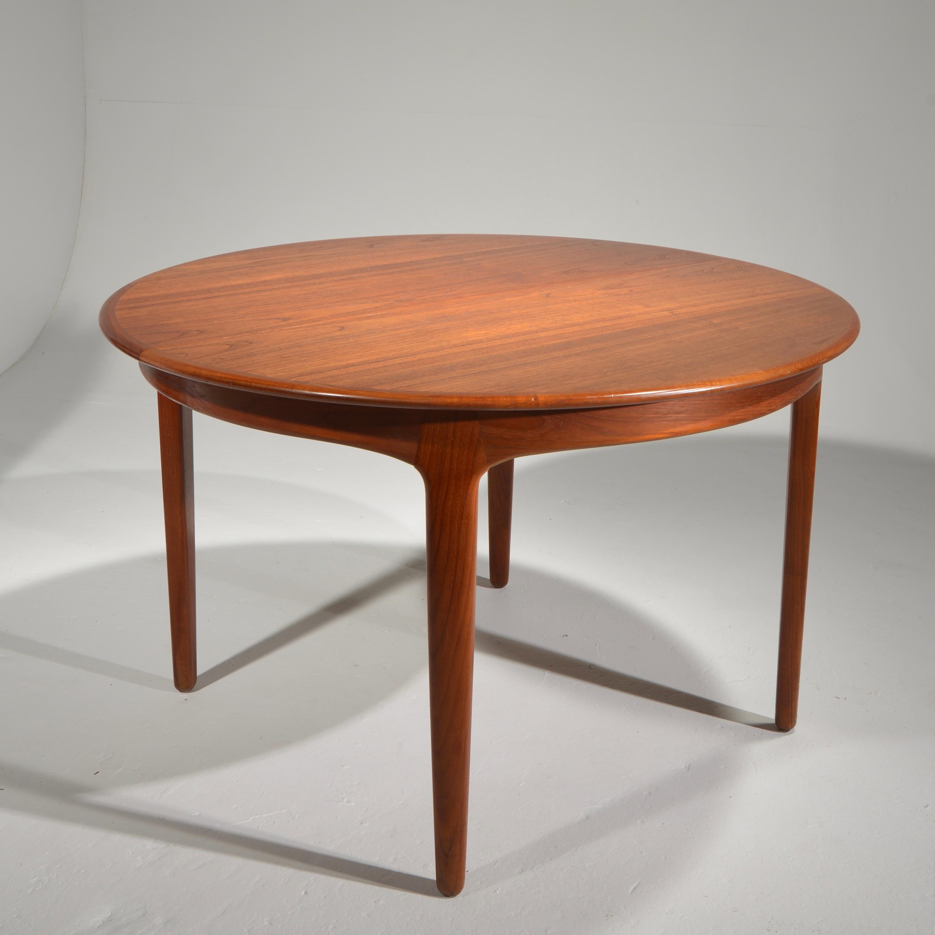 Extra Long Danish Teak Round Table with 4 Extensions by Henning Kjaernulf 3