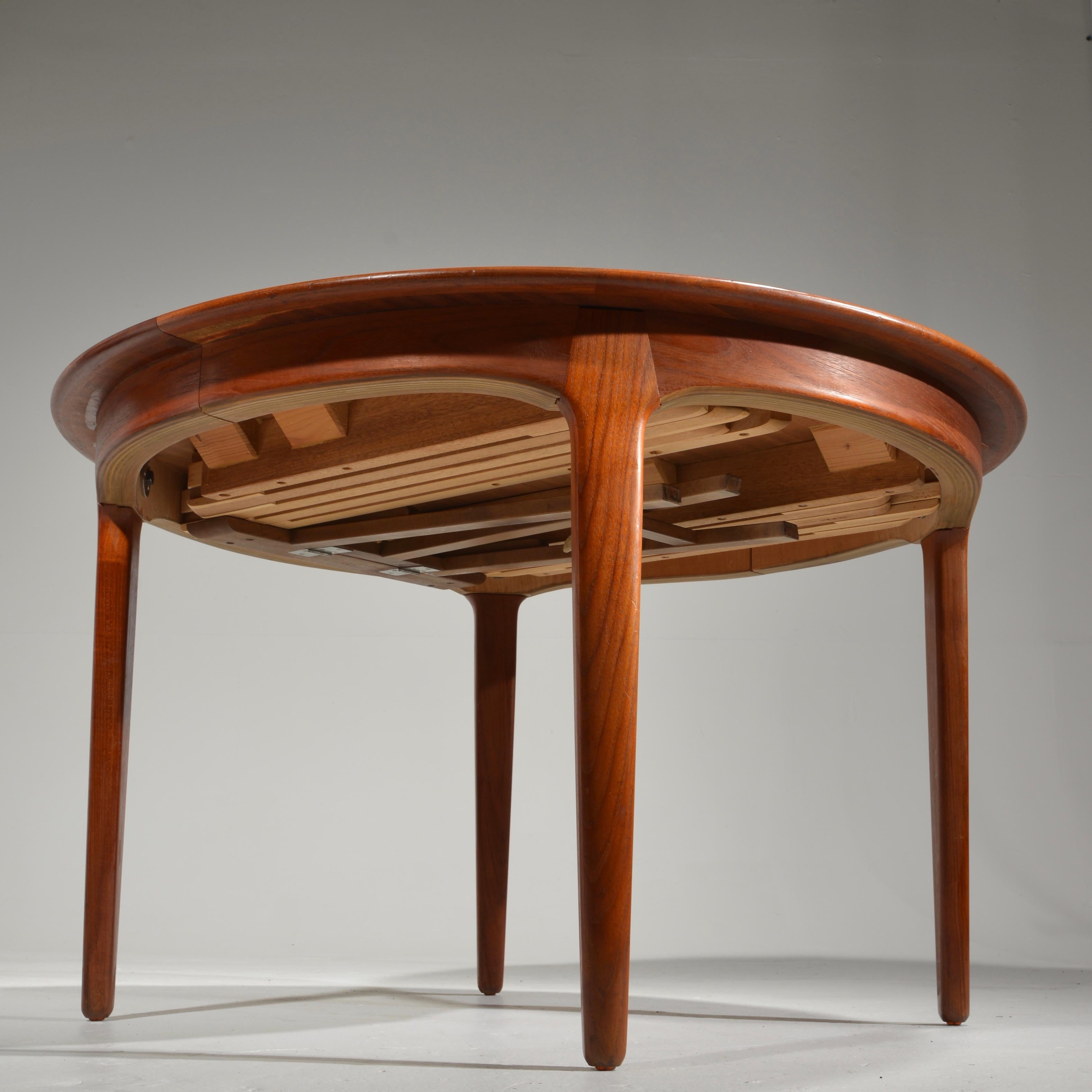 Extra Long Danish Teak Round Table with 4 Extensions by Henning Kjaernulf 5