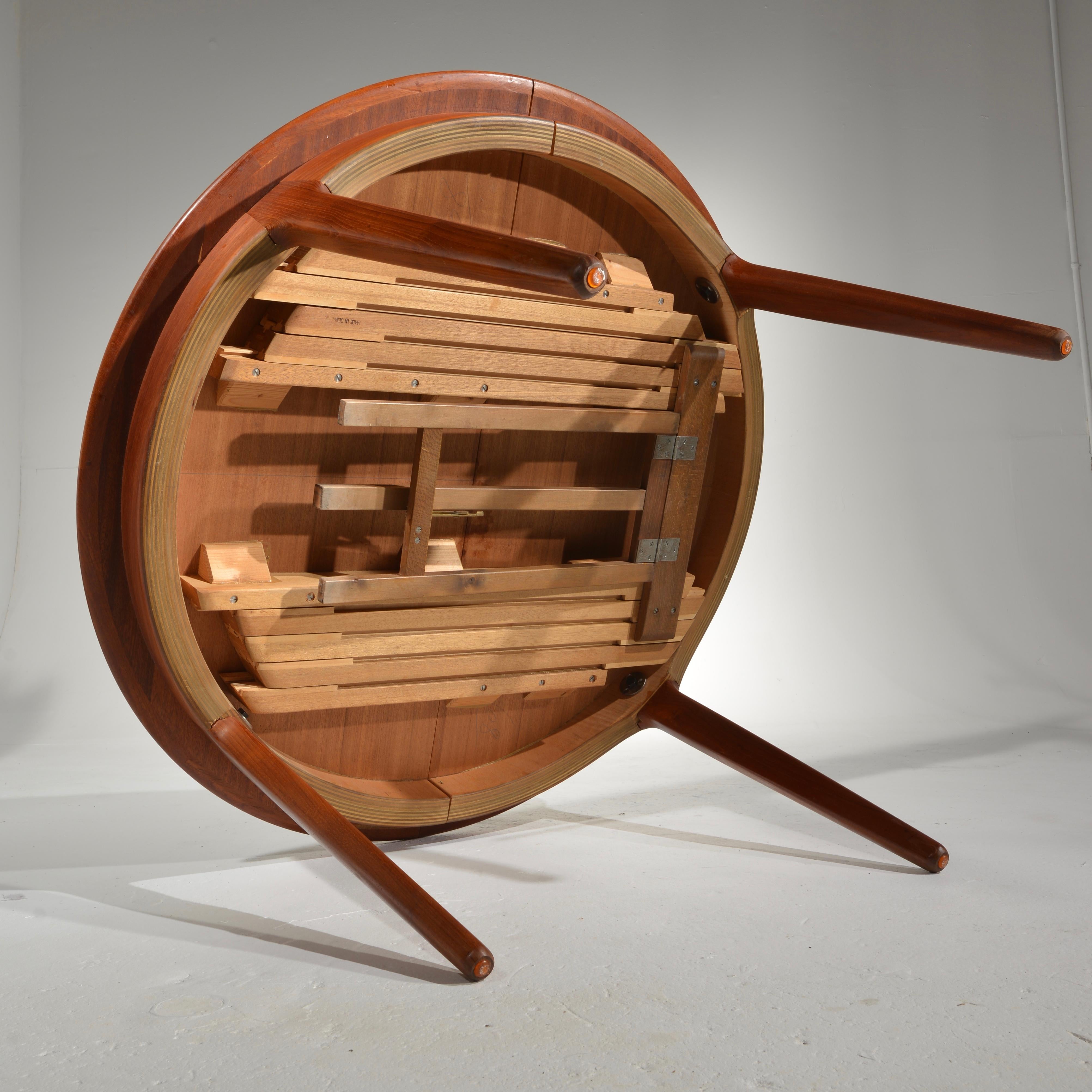 Extra Long Danish Teak Round Table with 4 Extensions by Henning Kjaernulf 7