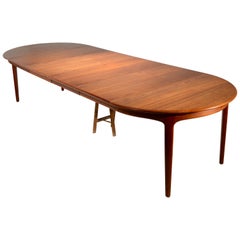 Vintage Extra Long Danish Teak Round Table with 4 Extensions by Henning Kjaernulf