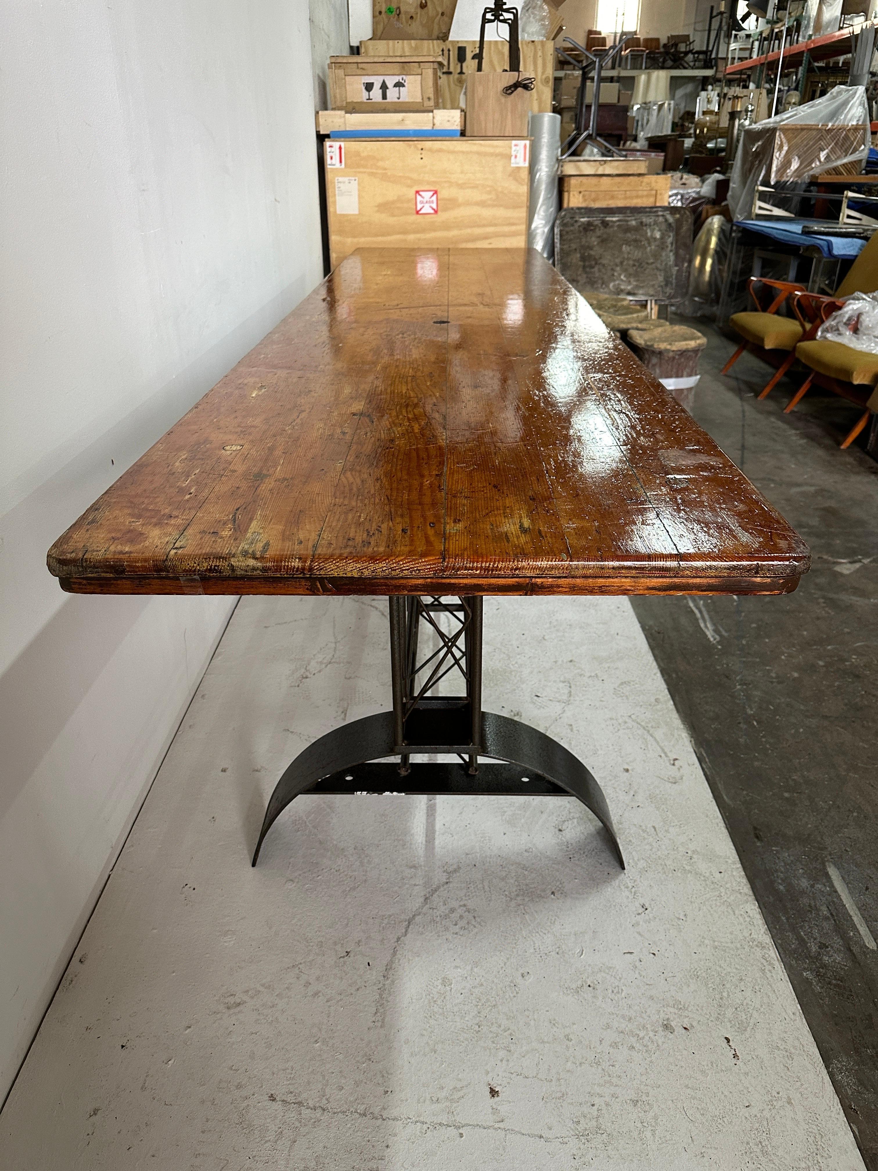 Not sure what we love MORE, the wonderful and intricate iron base OR the aged and worn wood top on this industrial dining table/ work table.  It is LONG and it is FABULOUS.  

NOTE: THIS ITEM IS LOCATED AND WILL SHIP FROM OUR MIAMI, FLORIDA SHOWROOM.