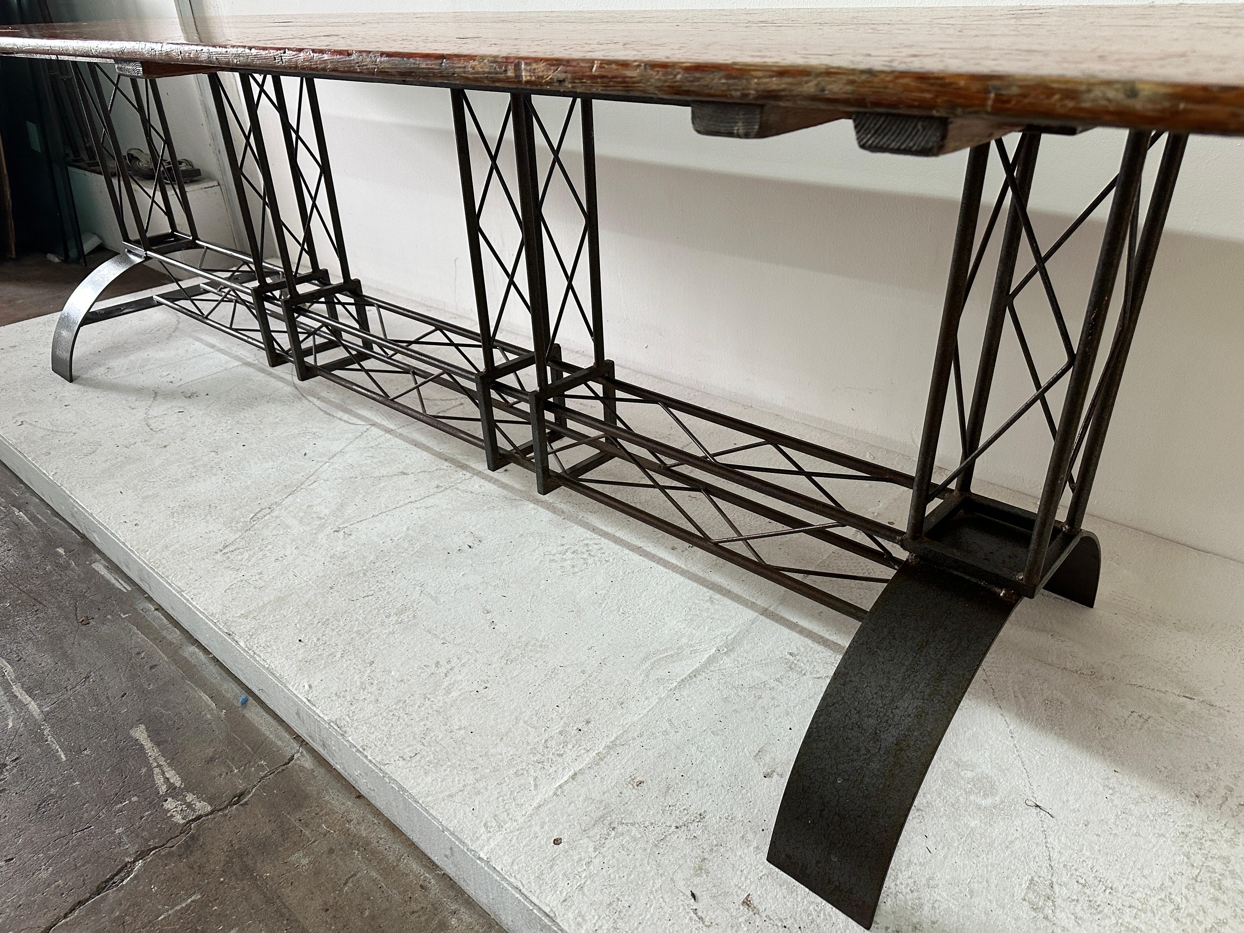 Extra Long French Architectural Iron Base Table w/ Distressed Wood Top In Good Condition For Sale In East Hampton, NY