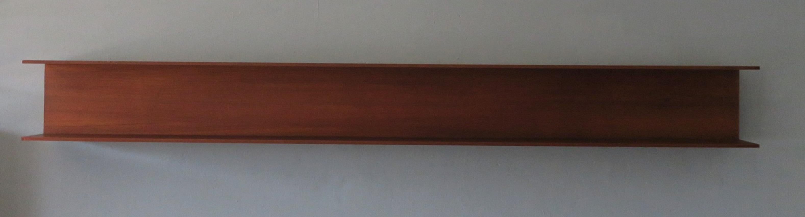 Extra long (240 cm) Walter Wirz for Wilhelm Renz floating teak shelf from the 1960s, with maker's label, in very good vintage condition with minimal signs of age and use.