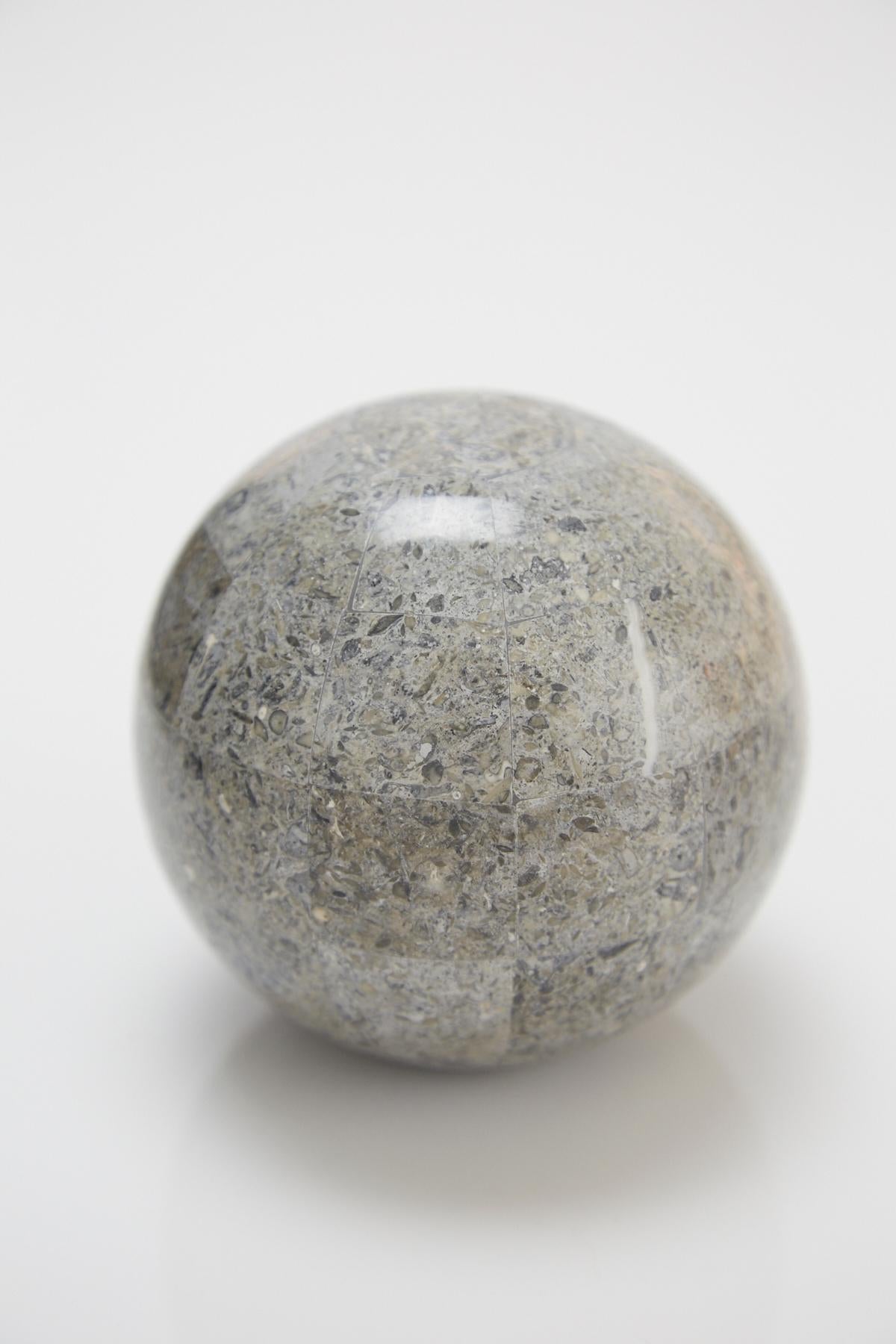 Extra small decorative sphere measuring 3.5 in. diameter. Tessellated gray stone over fiberglass sphere with flattened end for balance.