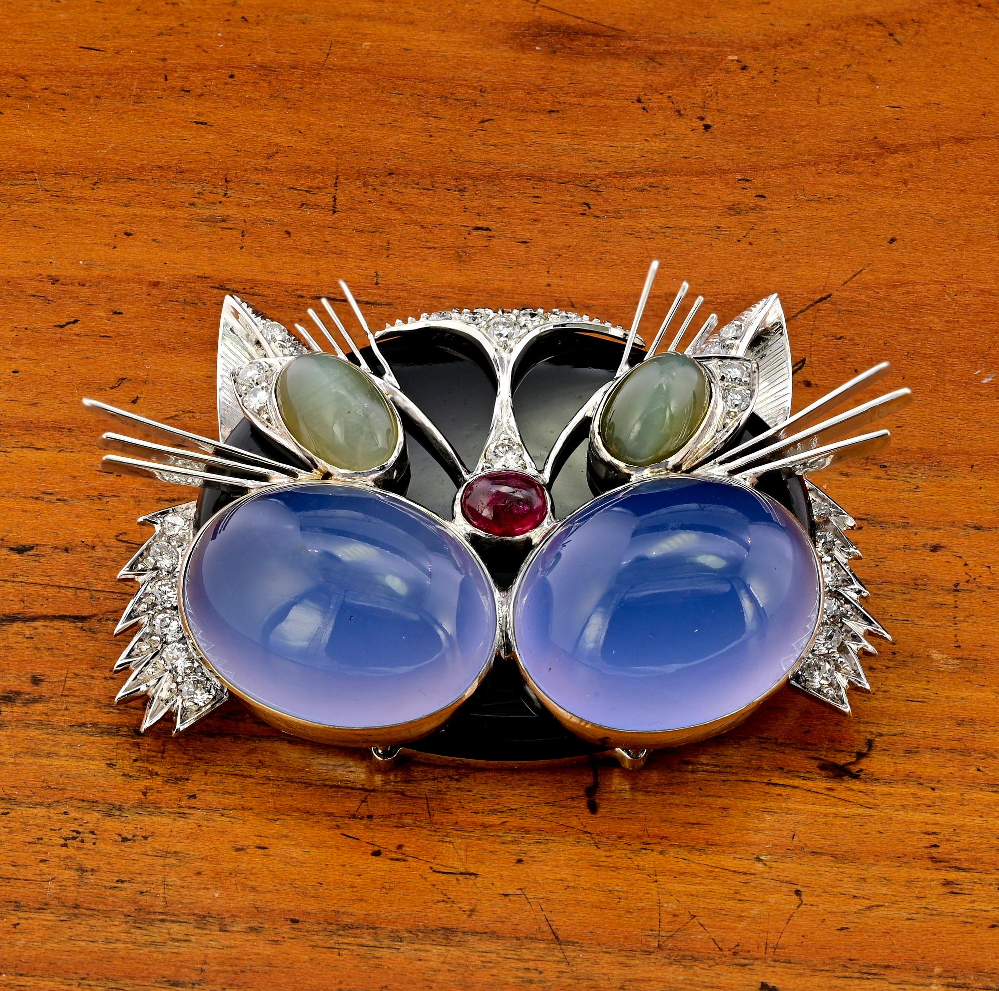 Extraordinary Fancy cat brooch pre 1970 circa- Italian origin
Hand crafted as unique piece of jewelry – no other one like this – solid 18 KT white gold
Marvelous Cut face created with amazing details of Diamond highlighting on white gold and rare
