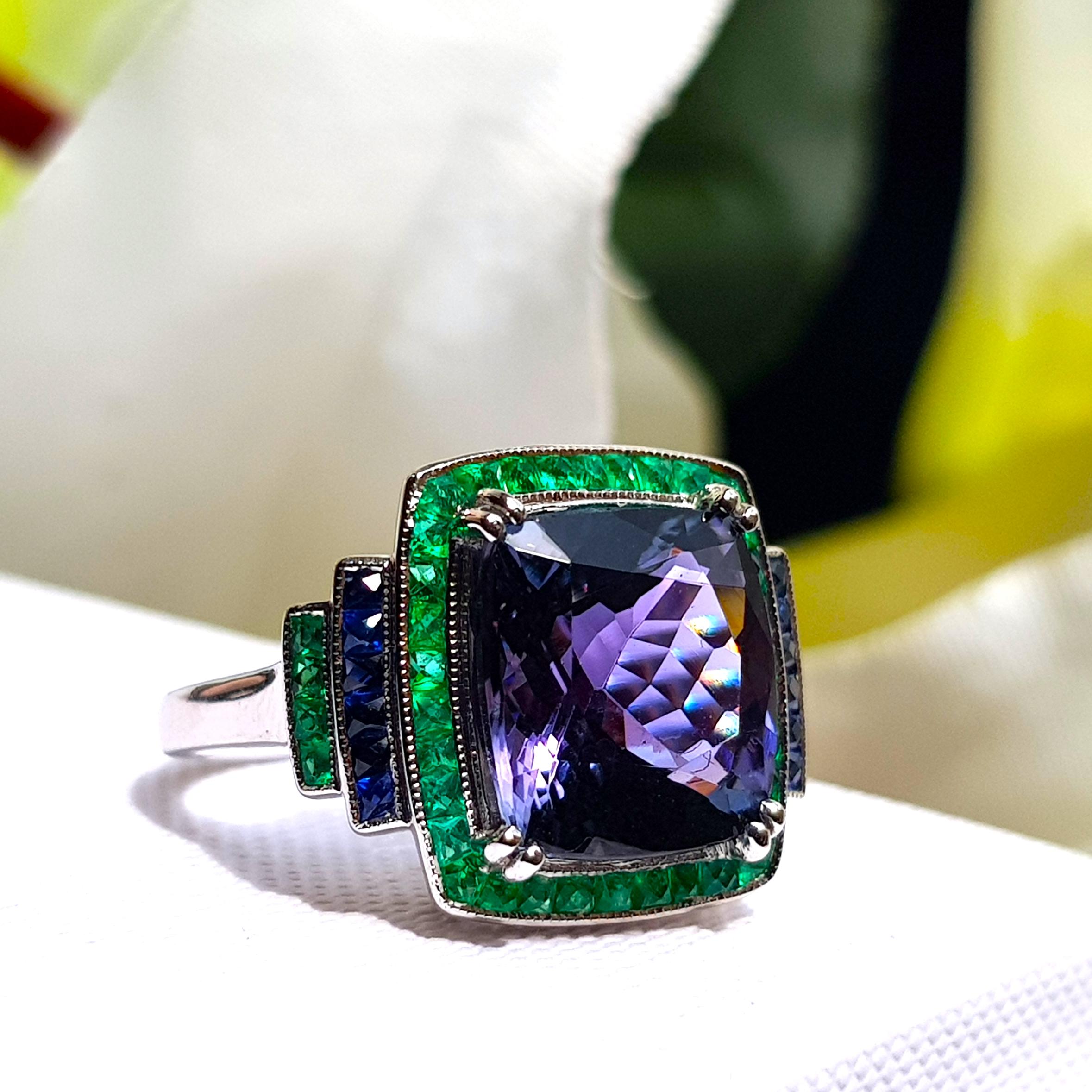 Extraordinary 6.56 Carats Cushion Tanzanite with Emerald and Sapphire Halo Ring 3