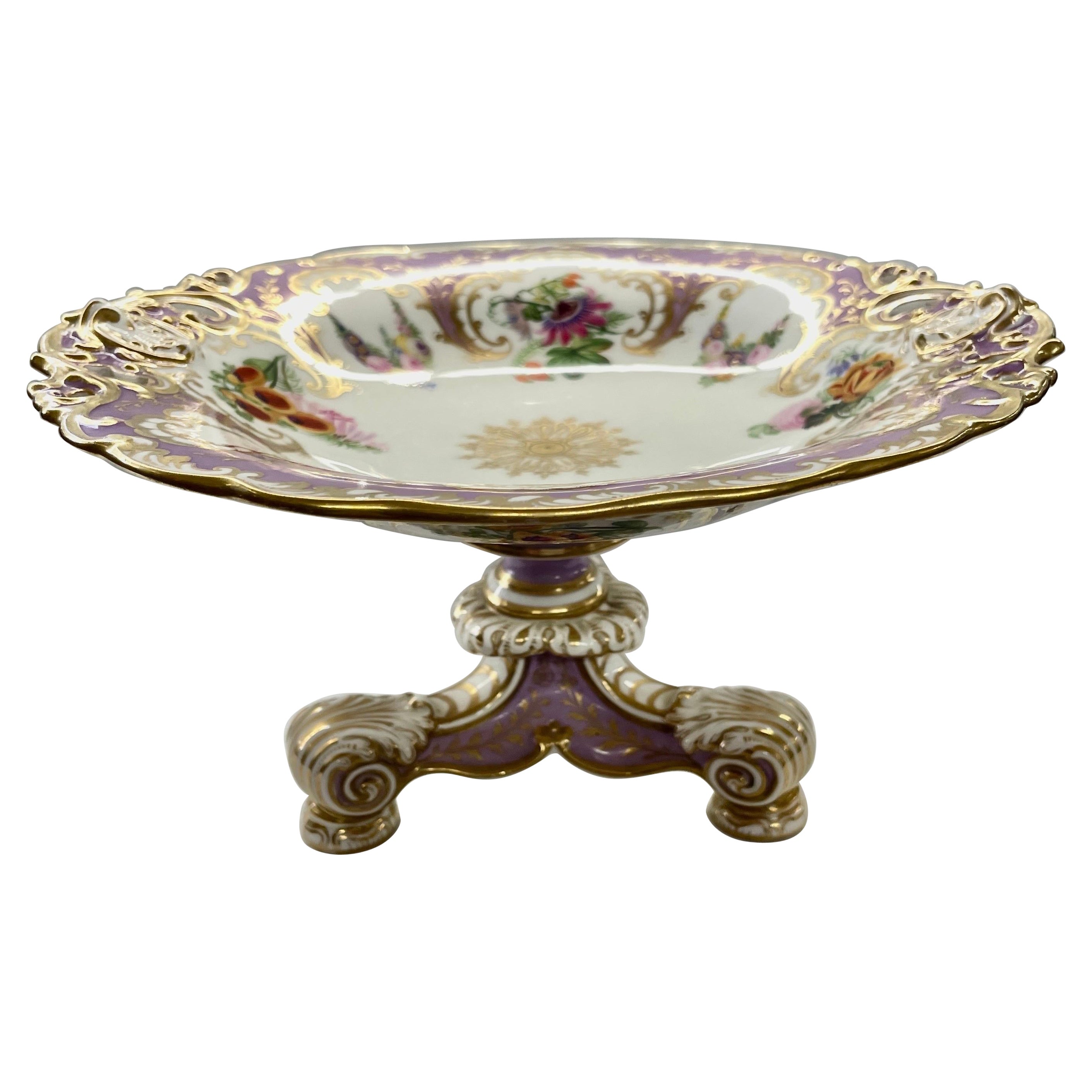 Quite possibly one of the finest pieces of porcelain to emerge from the Copeland (Spode) factory, this tazza or dessert compote is meticulously hand painted with botanical images done more finely than any we have ever seen to date both above AND