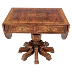 Extraordinaire table à feuilles tombantes ancienne en bois figuré et marqueterie à restaurer