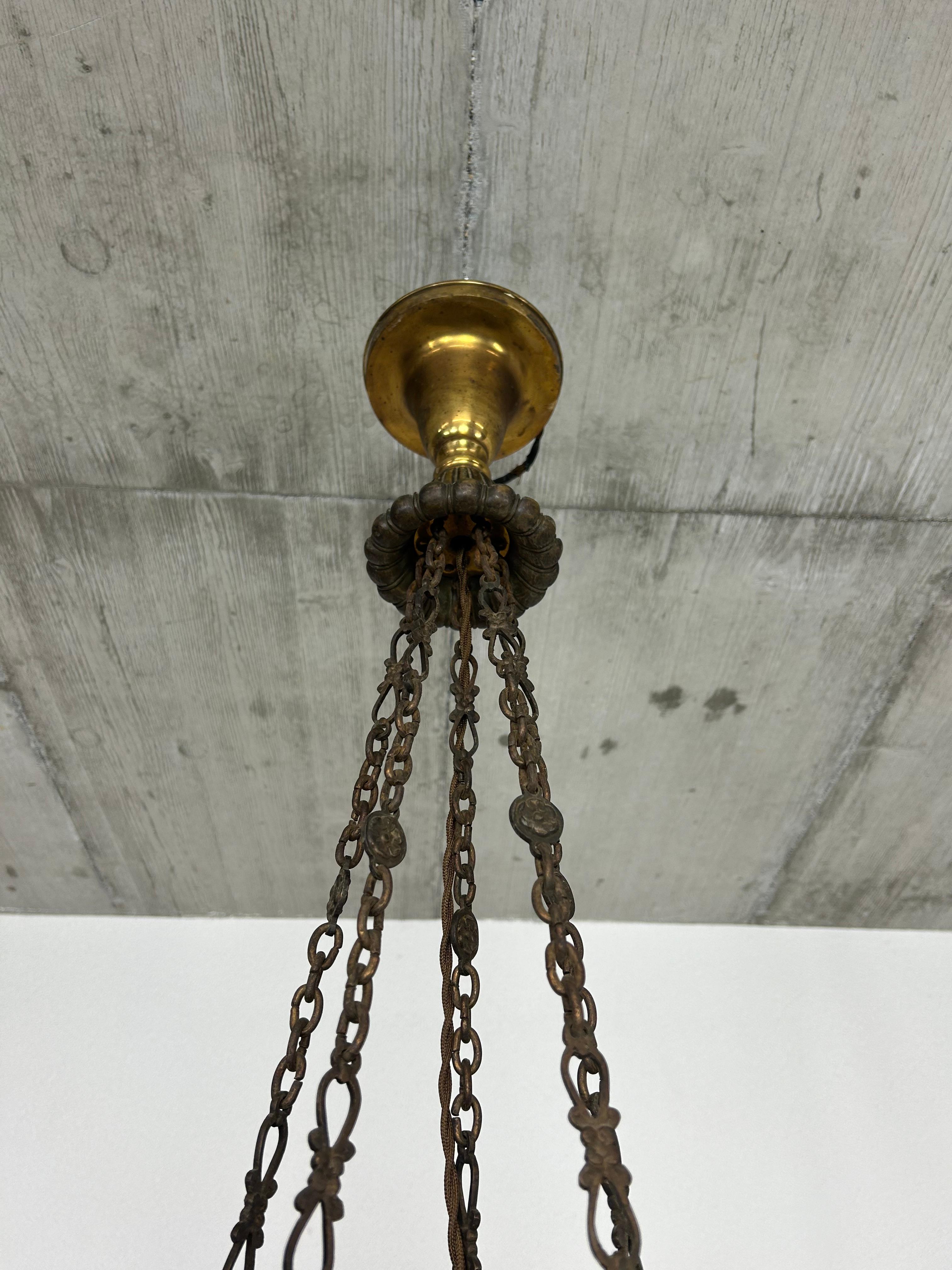 Extraordinaria araña art decó con águilas de bronce Latón en venta