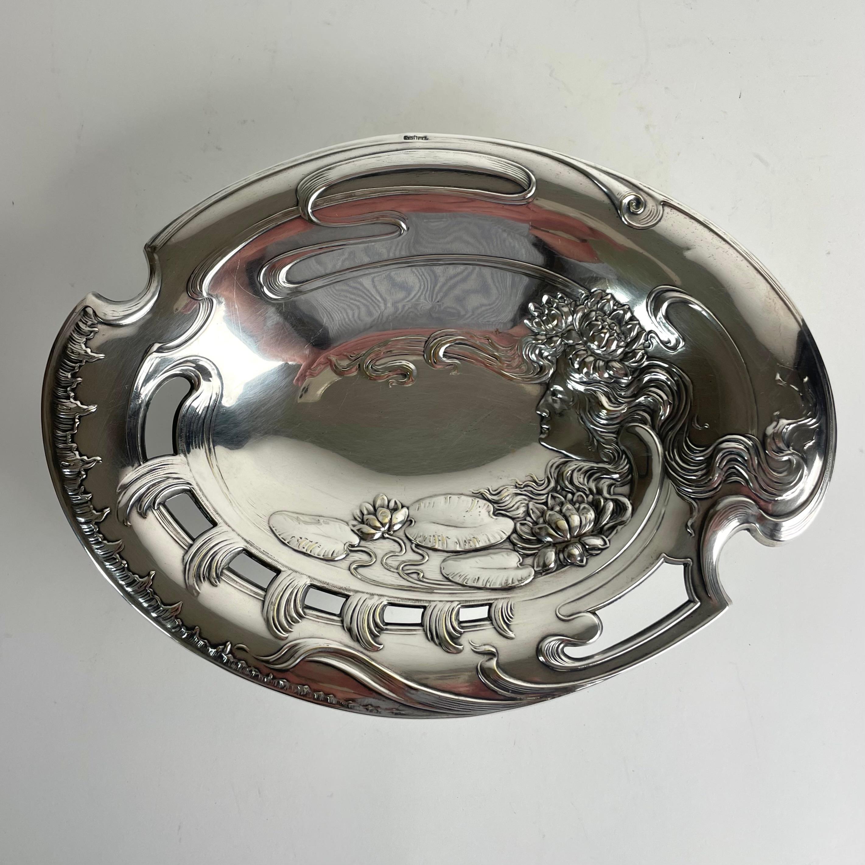 
Extraordinary Art Nouveau Silvered Brass Dish, Stockholm, ca. 1900

An exceptional serving or fruit dish in silvered brass, crafted in Stockholm, Sweden, around 1900. This piece is a striking example of extreme Art Nouveau (Jugendstil) design,